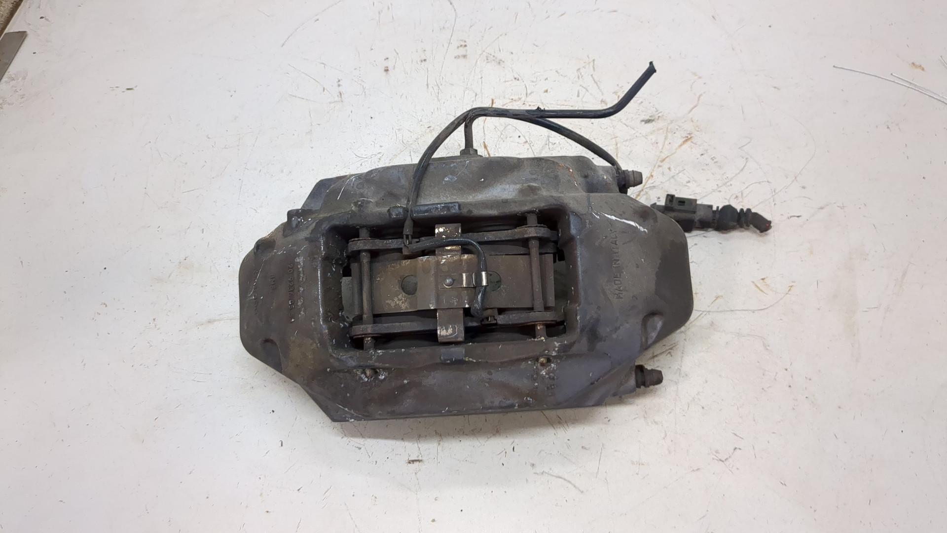 Суппорт передний левый