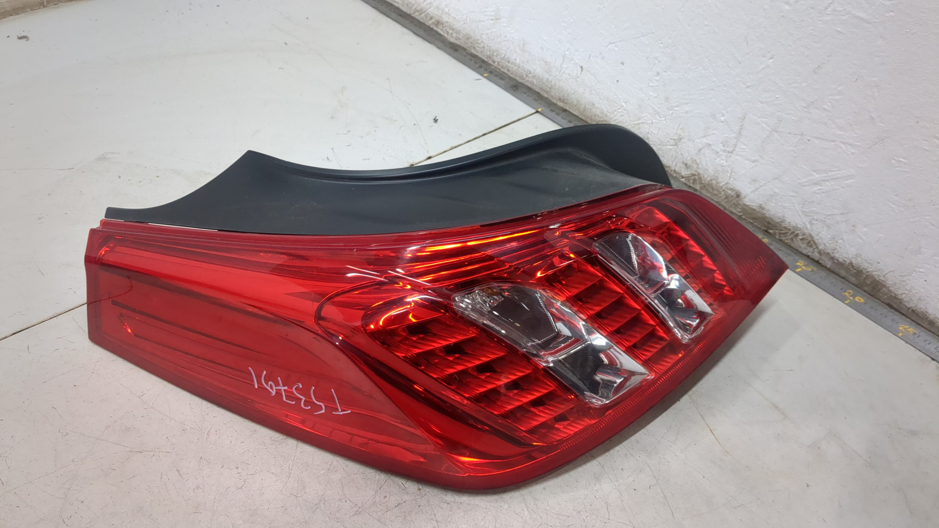 Фонарь задний левый