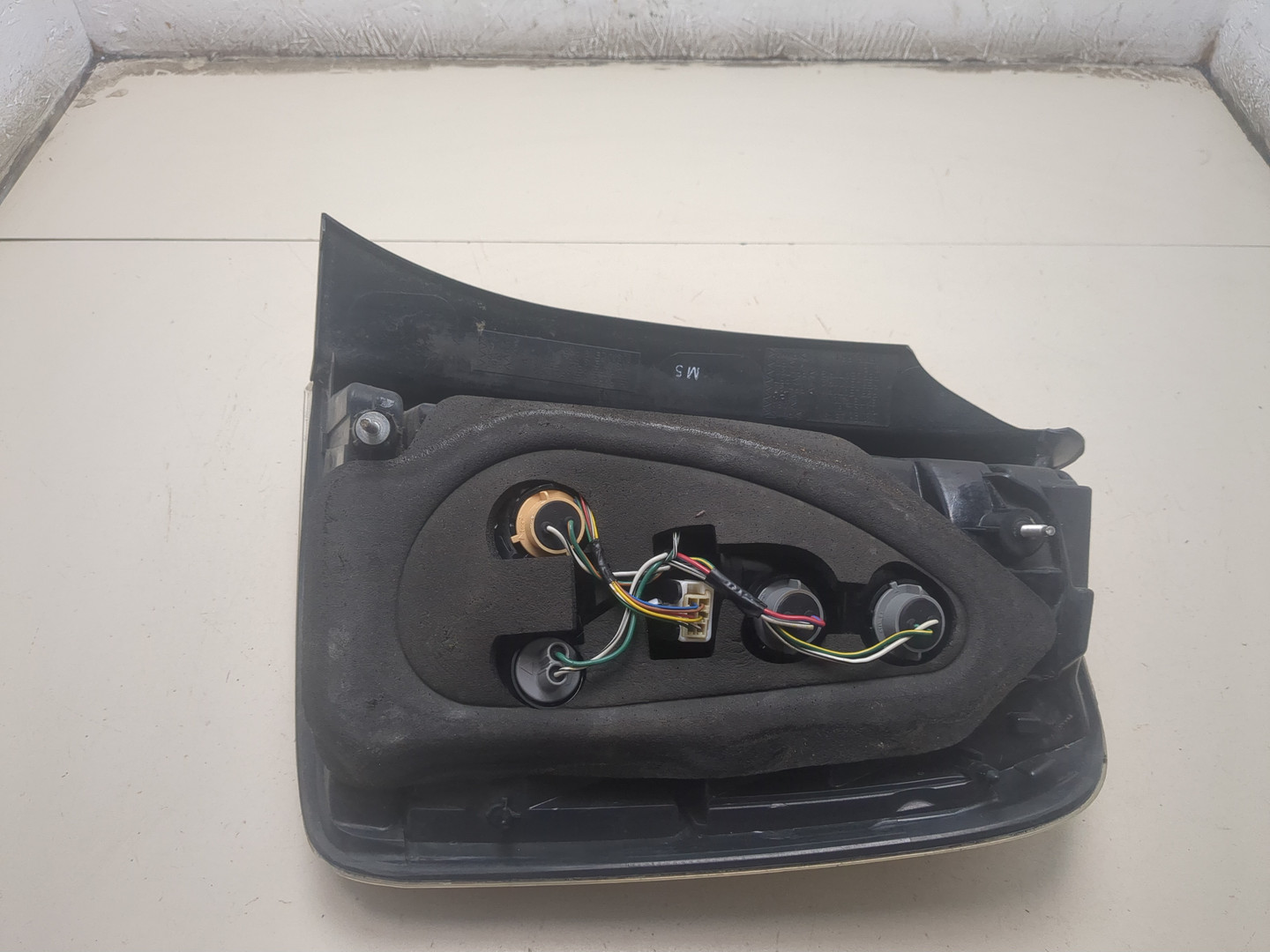 Фонарь задний левый