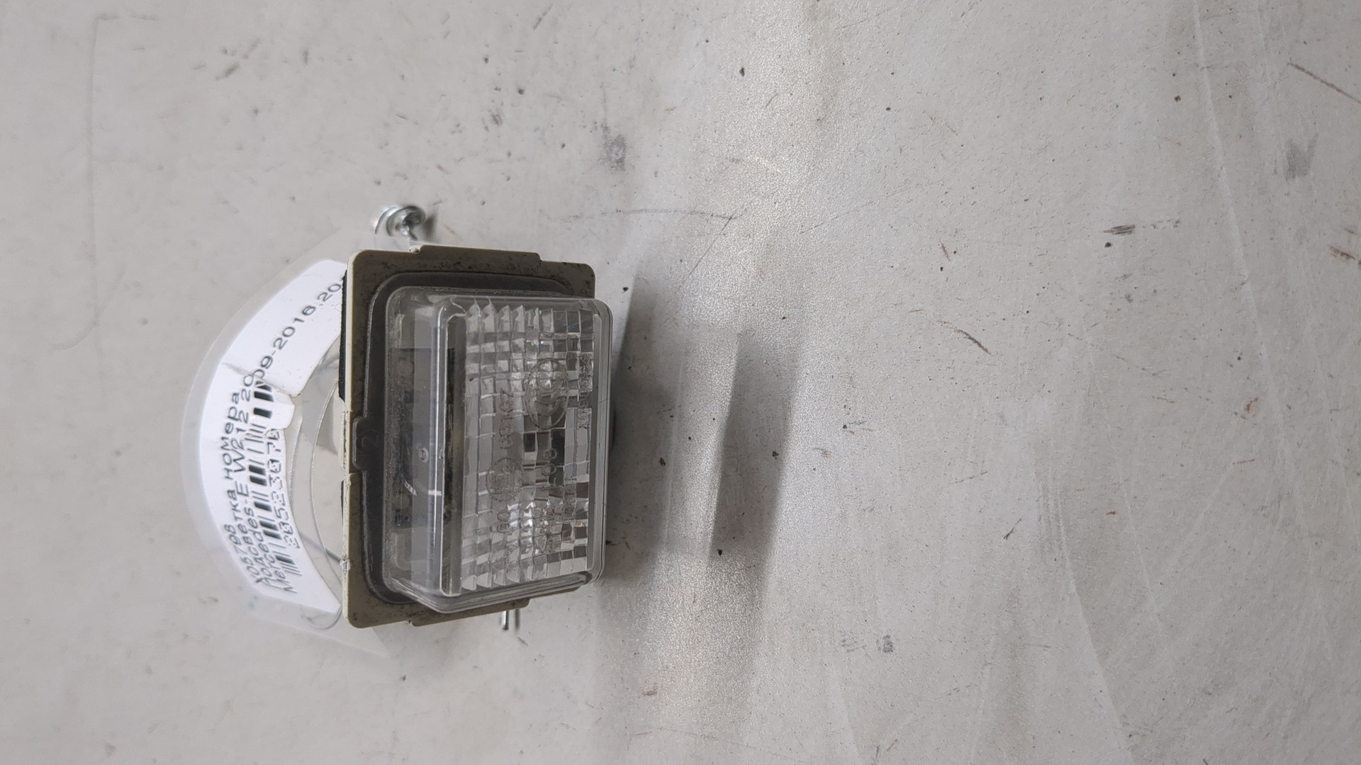 Фонарь подсветки номера