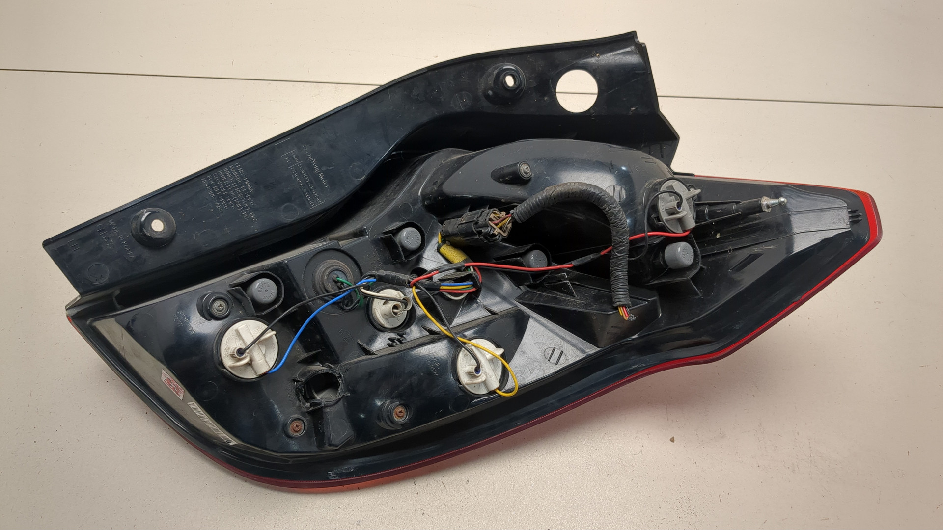 Фонарь задний левый