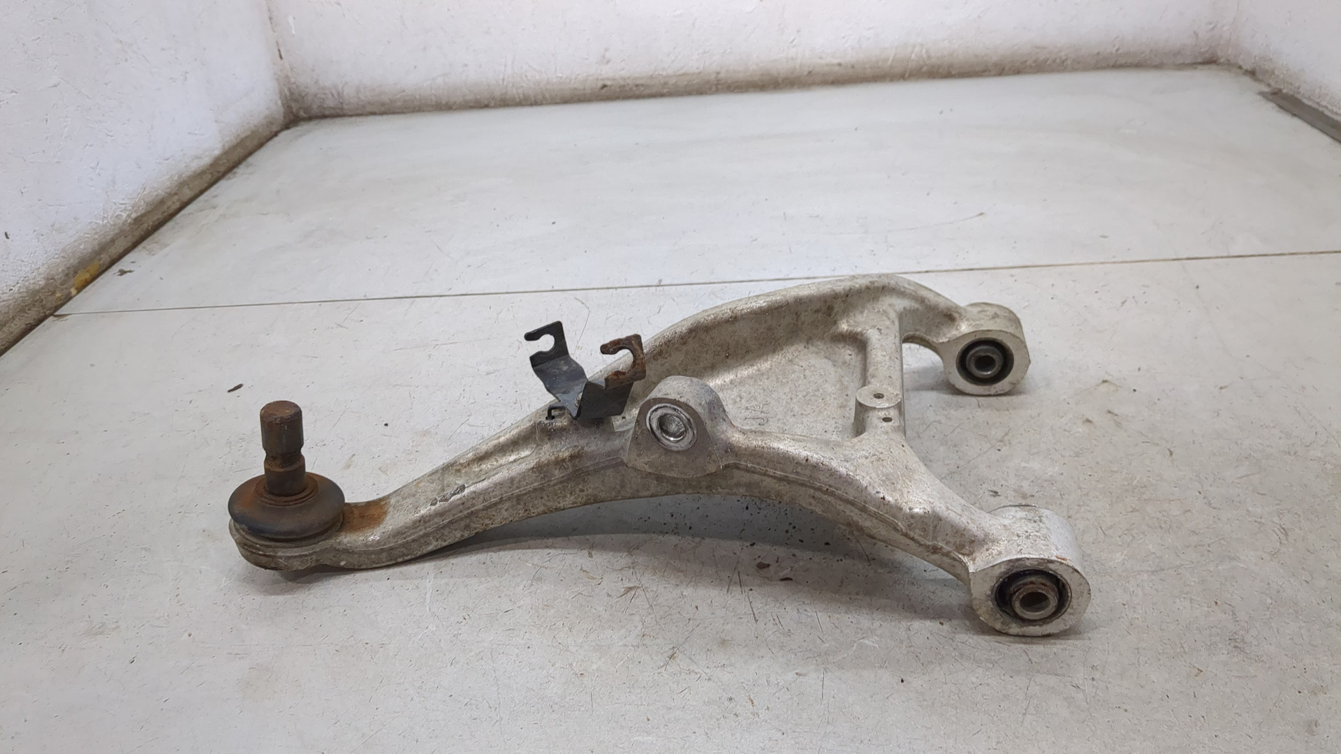 Рычаг задний левый