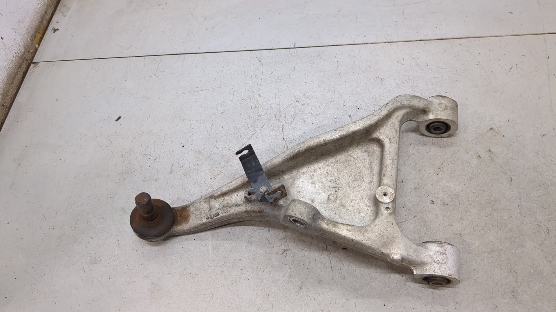 Рычаг задний левый