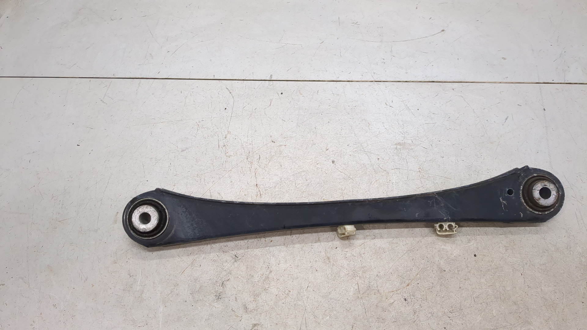 Рычаг задний левый