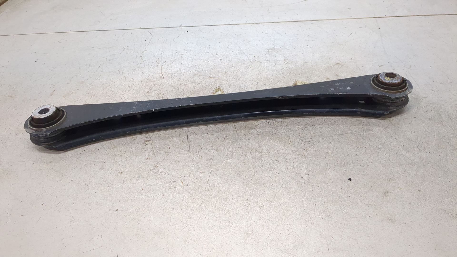 Рычаг задний левый