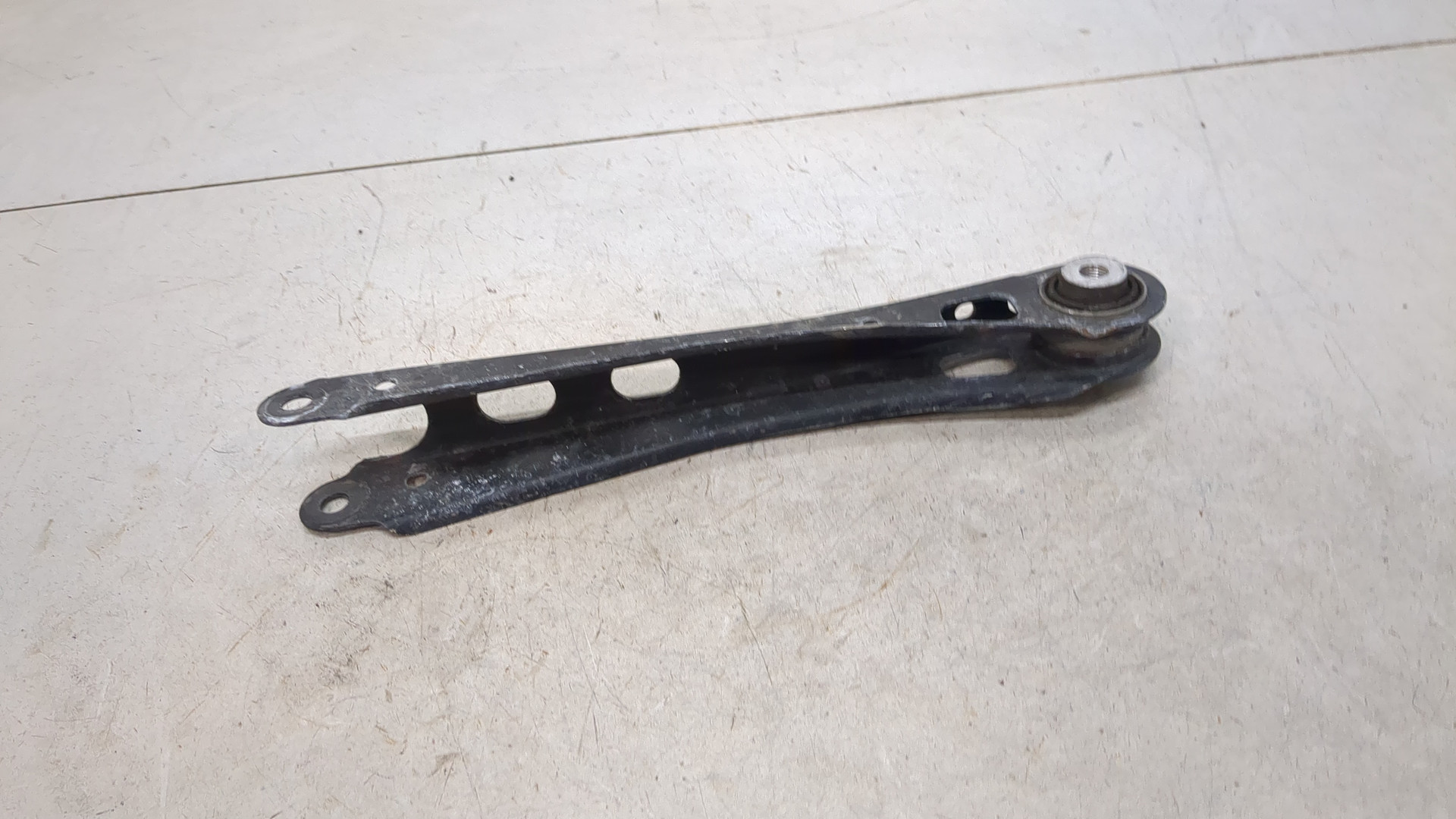 Рычаг задний