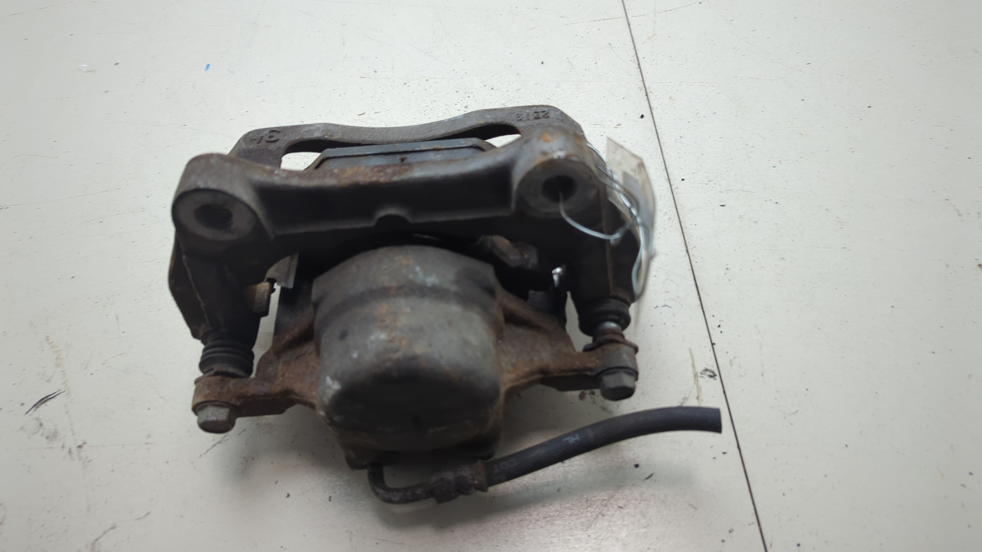 Суппорт передний левый