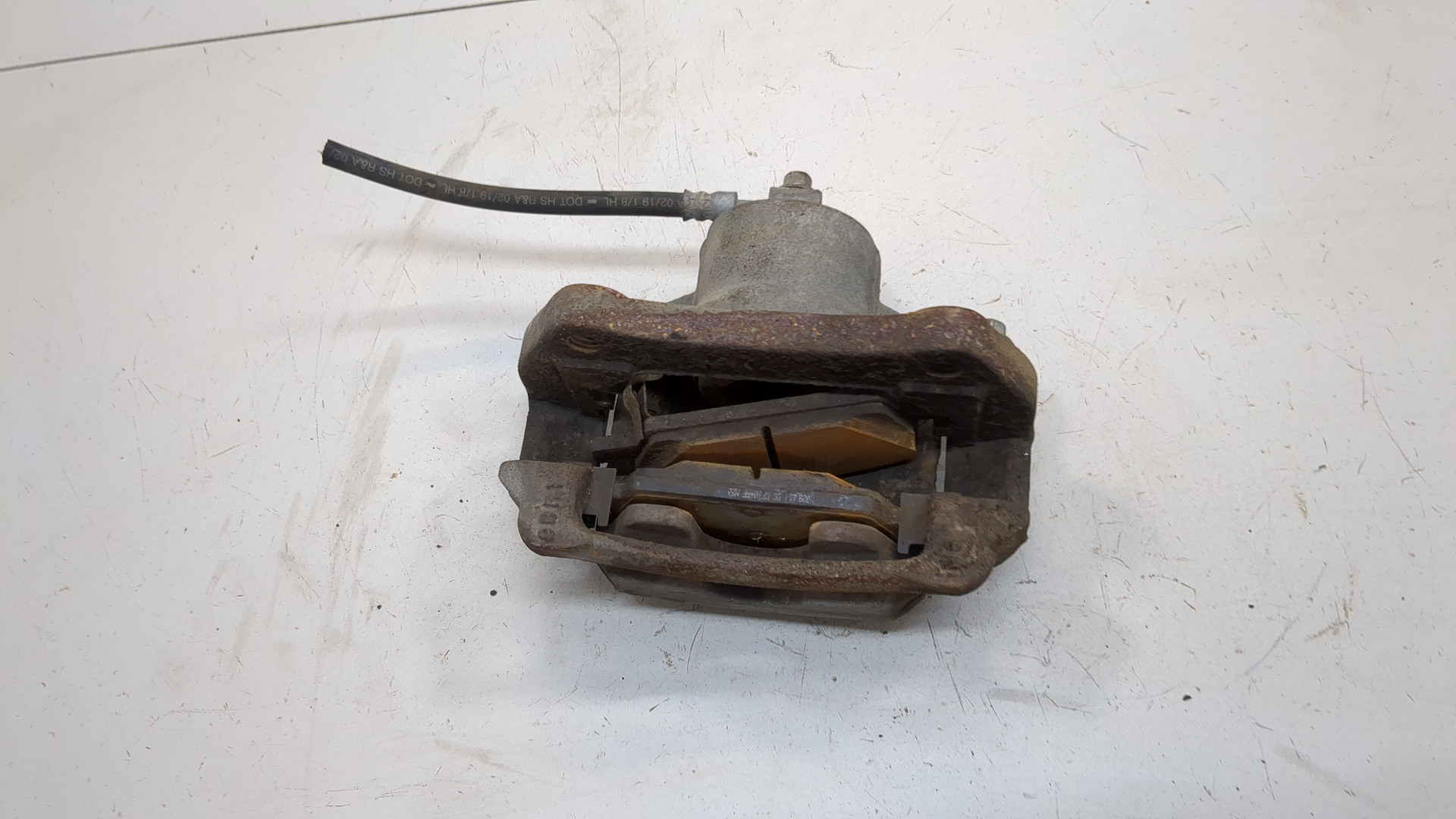 Суппорт передний левый