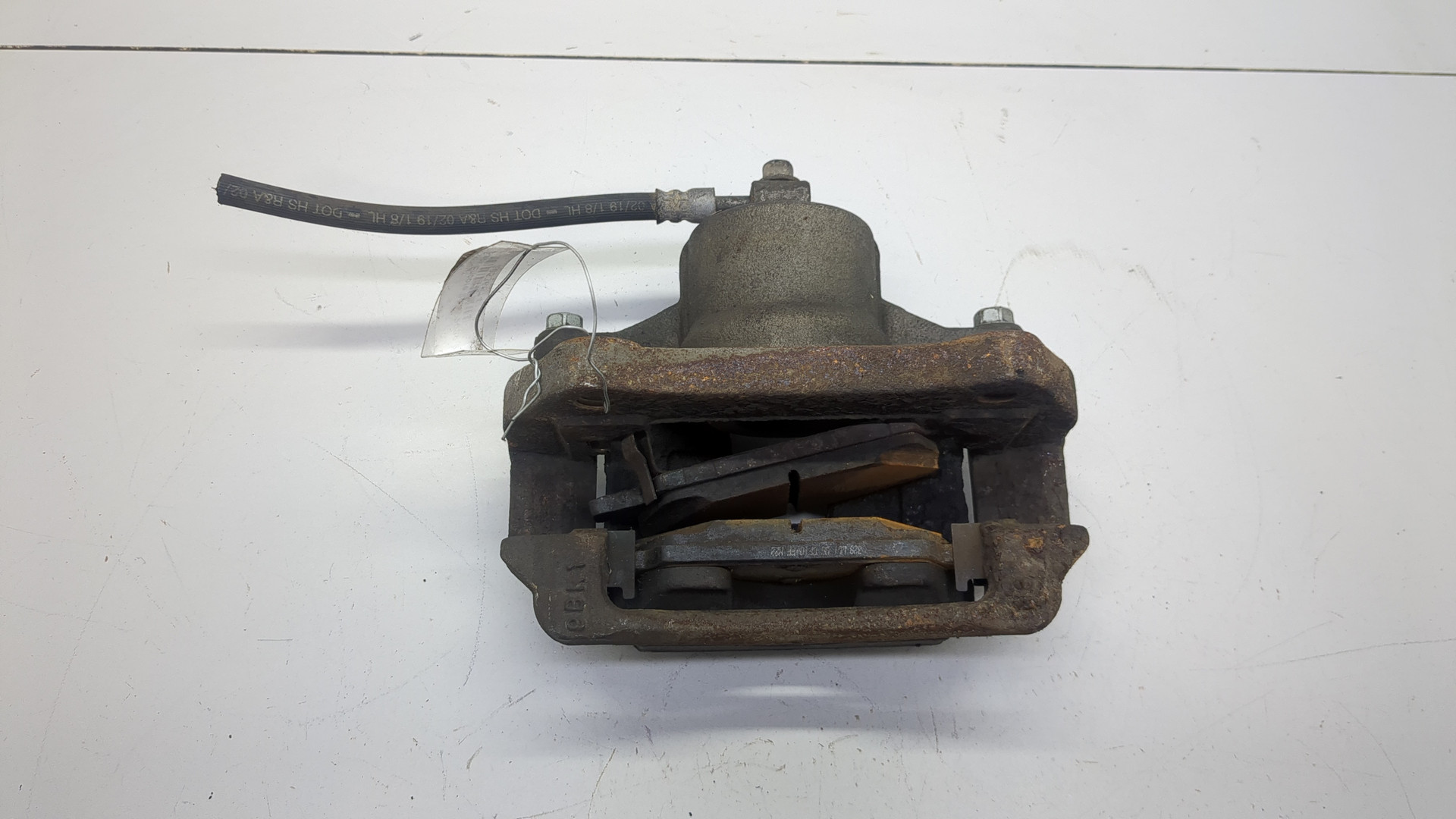 Суппорт передний левый