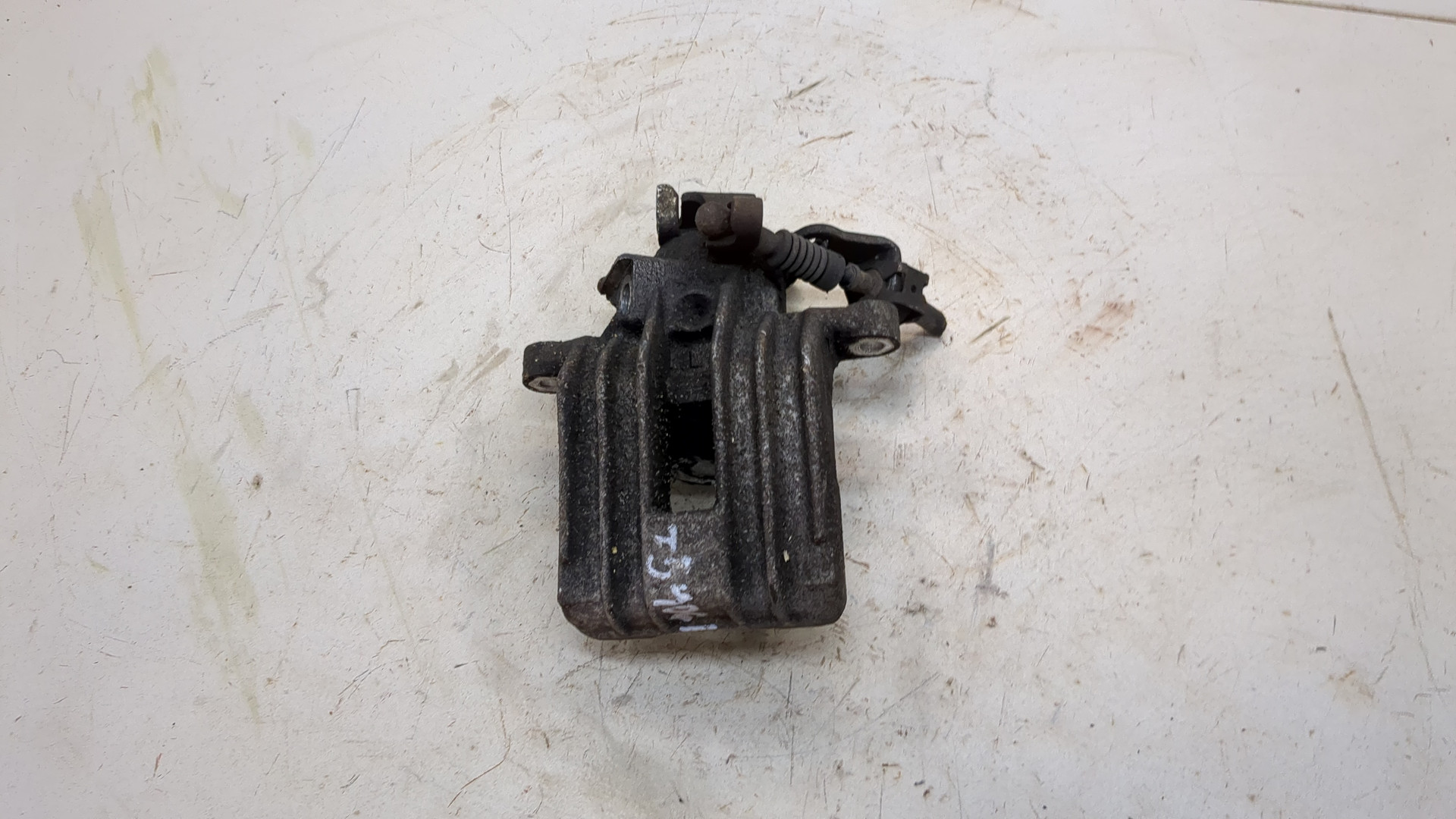 Суппорт задний левый