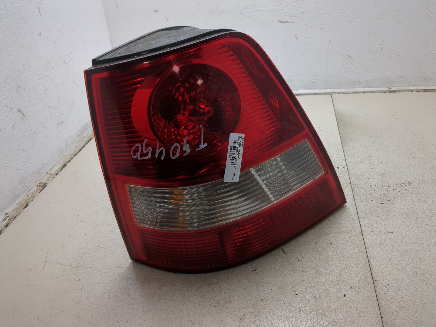 Фонарь задний левый