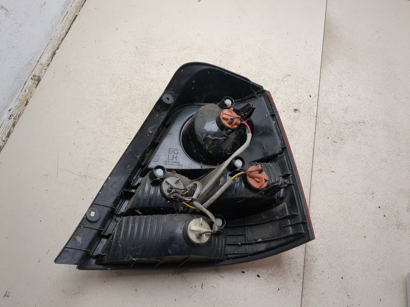 Фонарь задний левый