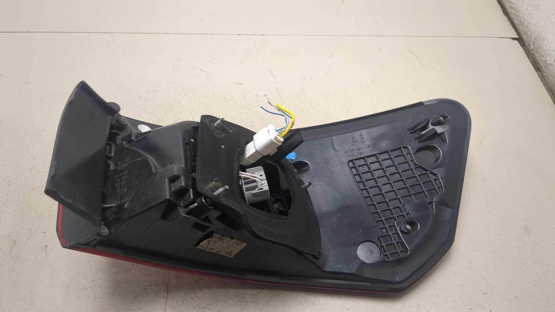 Фонарь задний левый