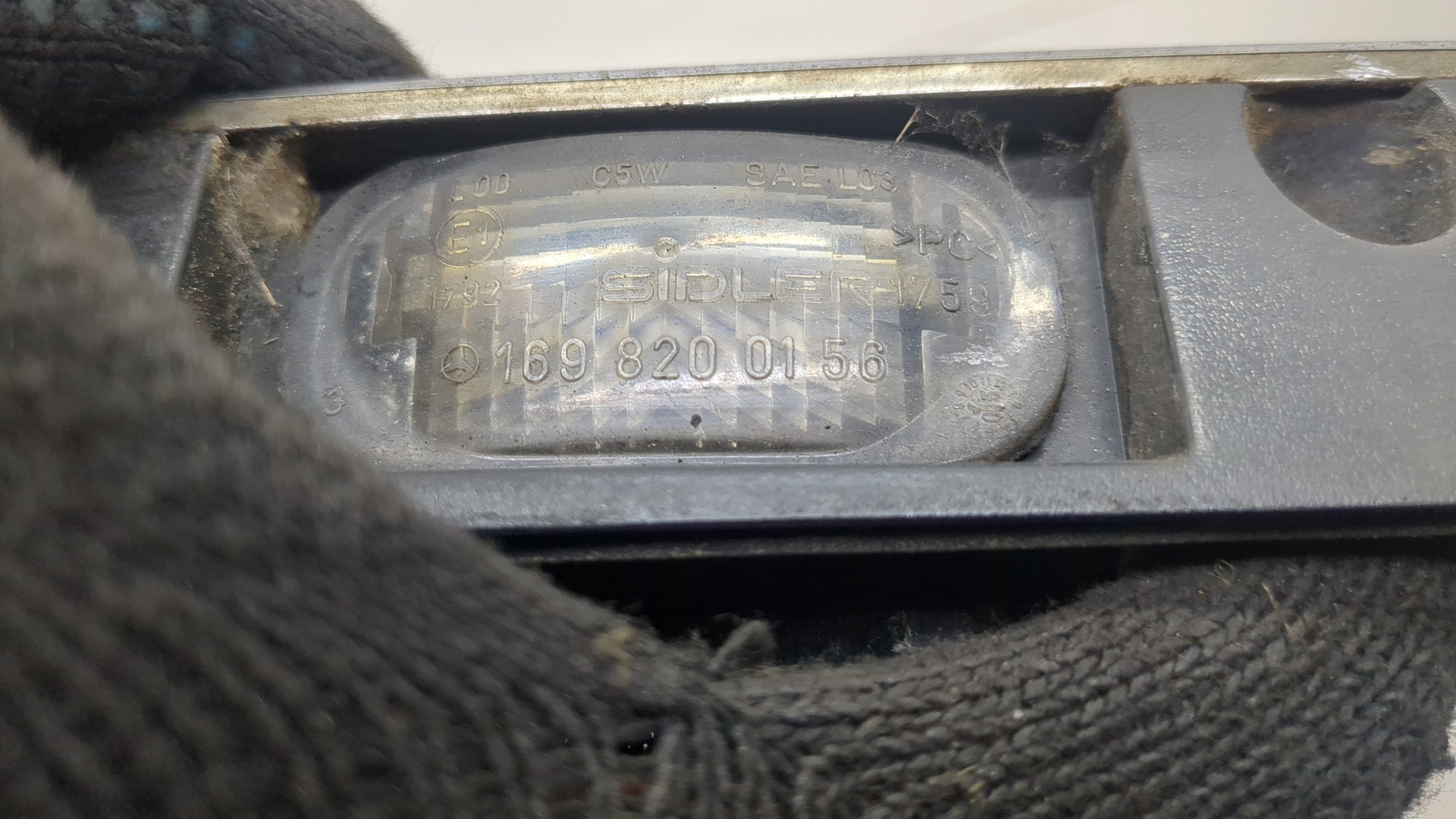 Фонарь подсветки номера