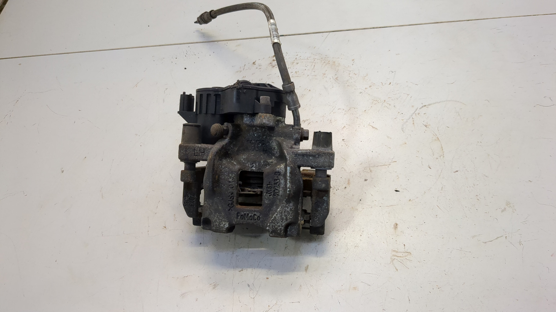 Суппорт задний левый