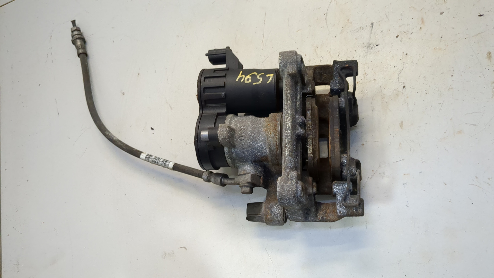 Суппорт задний левый