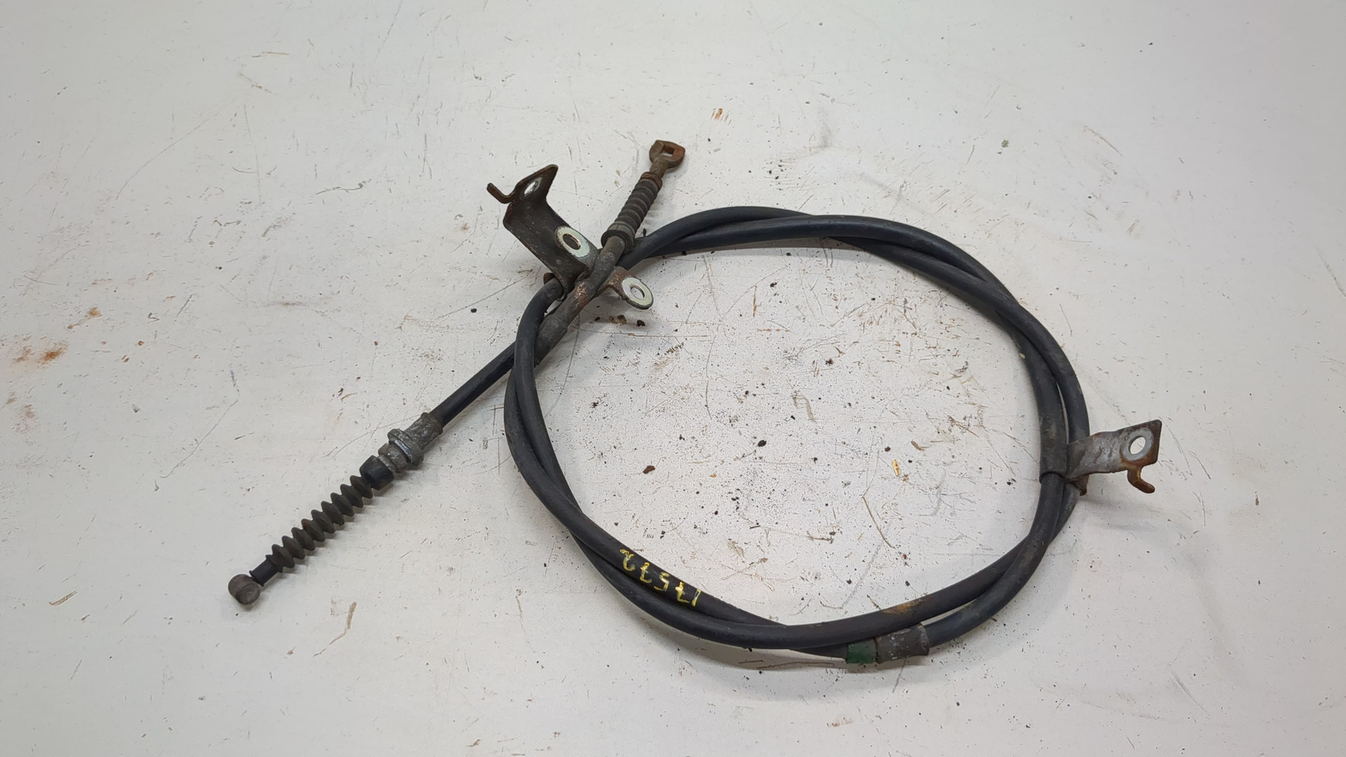 Трос стояночного тормоза