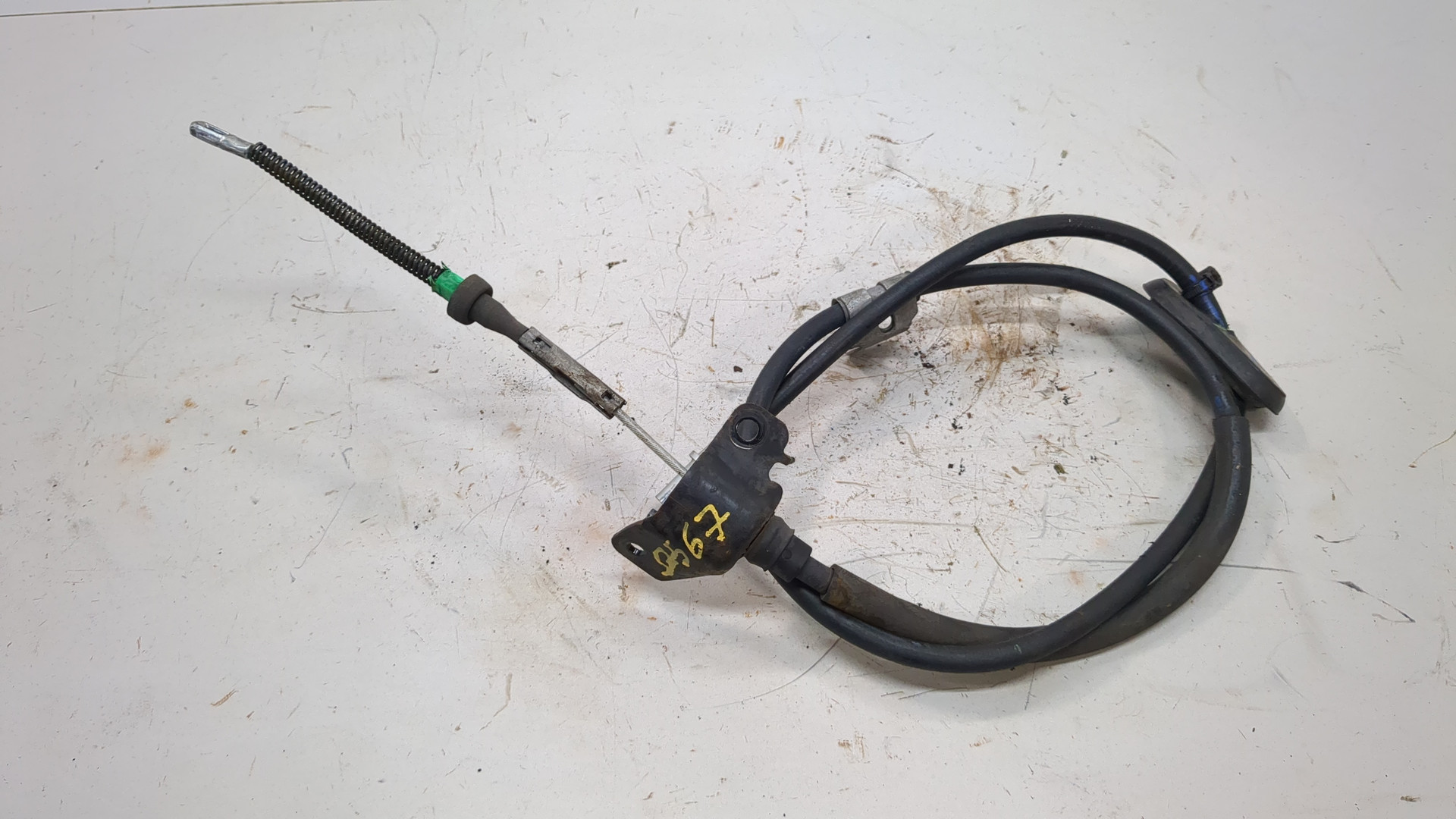 Трос стояночного тормоза