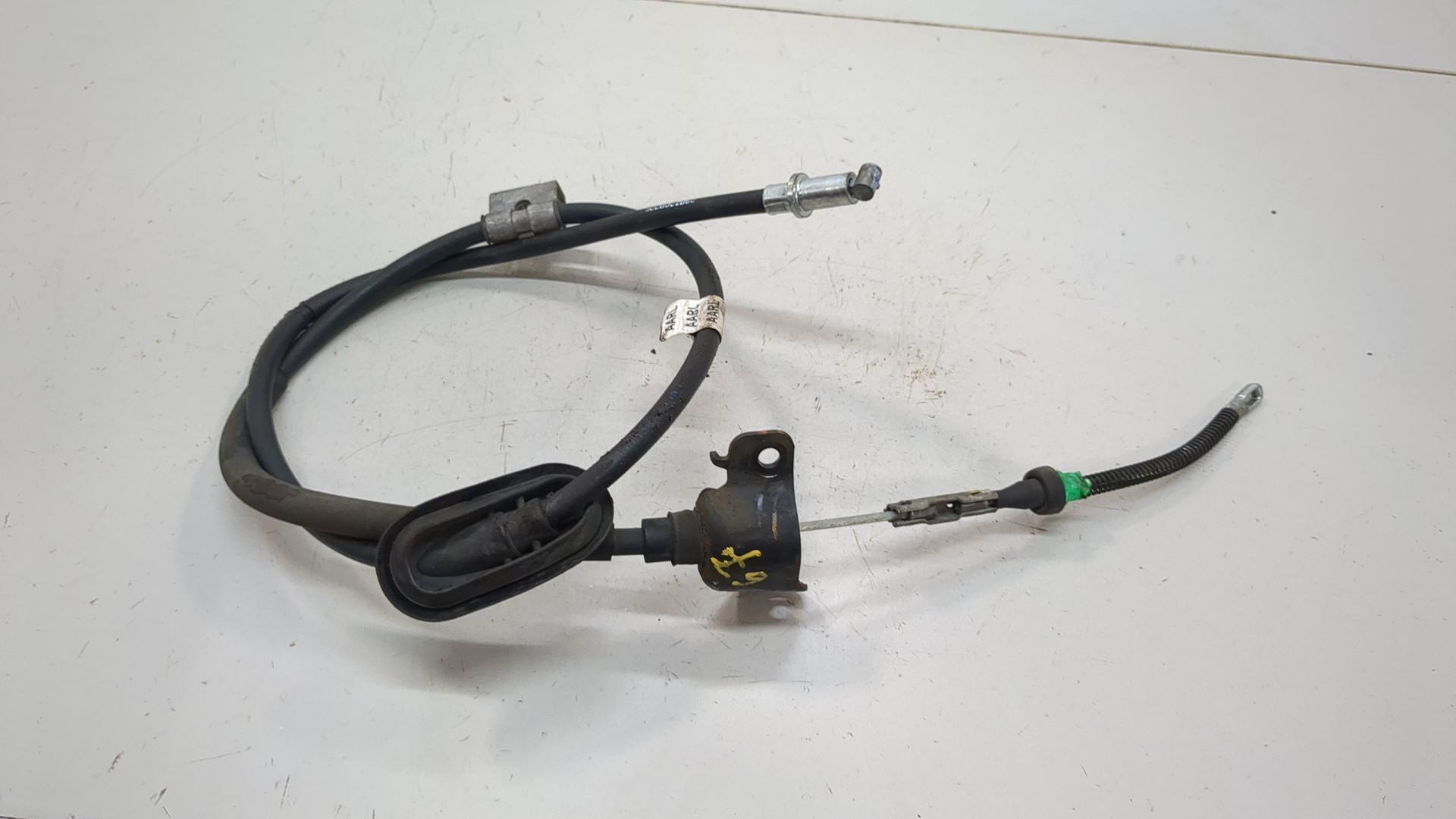 Трос стояночного тормоза