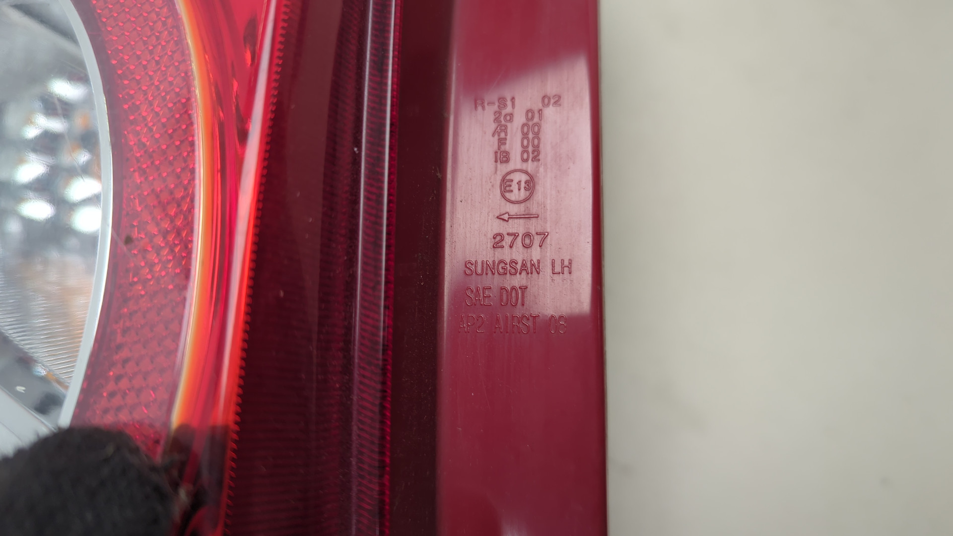 Фонарь задний левый