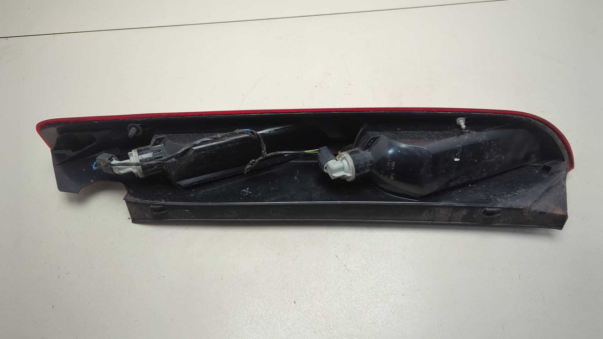 Фонарь задний левый