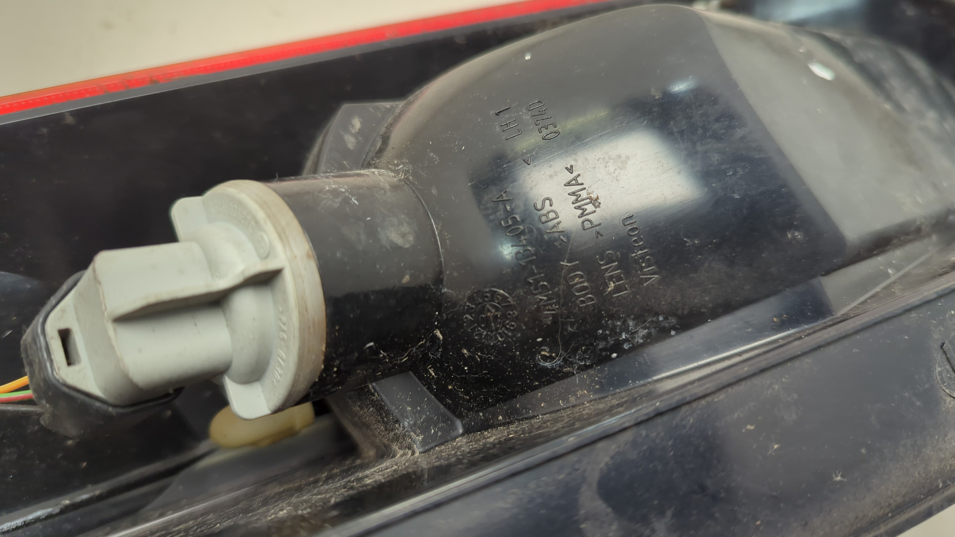 Фонарь задний левый