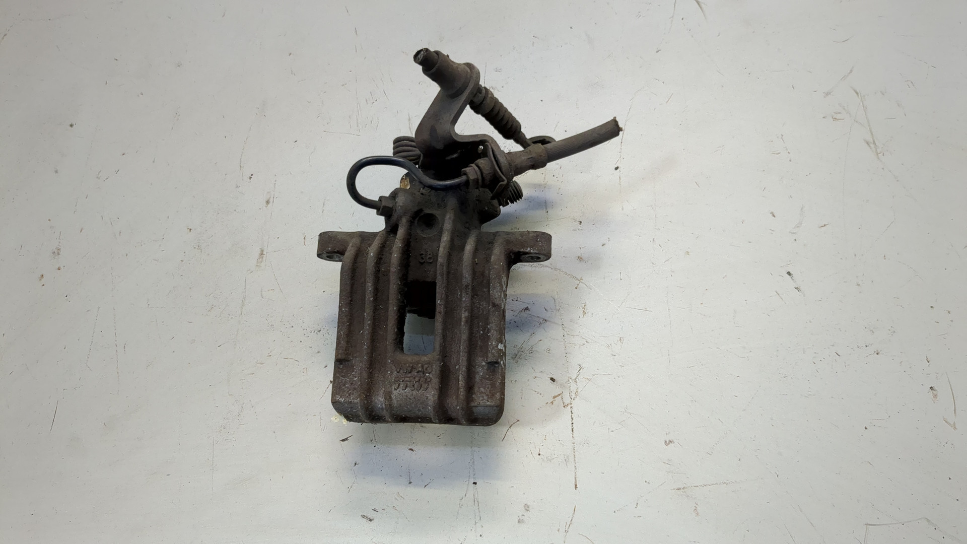 Суппорт задний левый