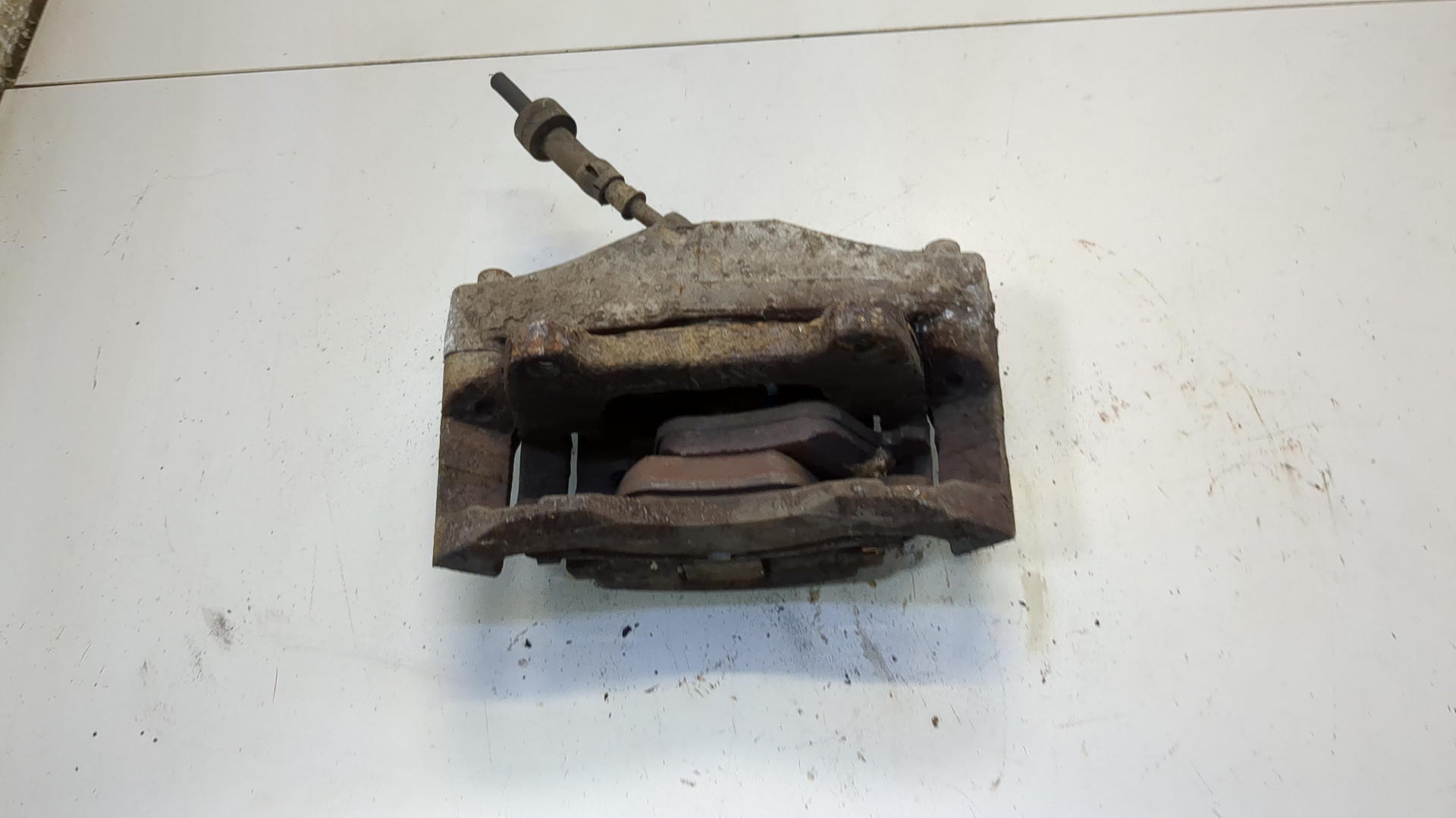 Суппорт передний левый