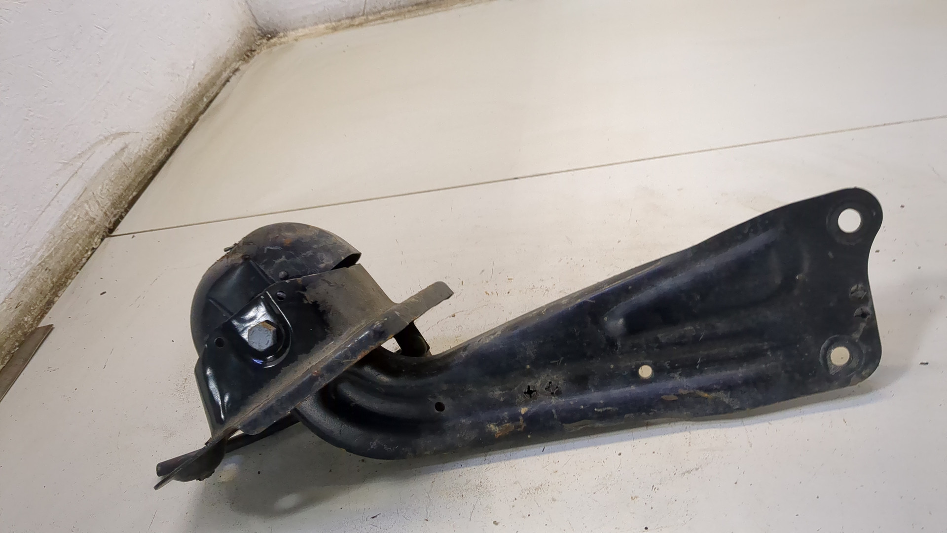 Рычаг задний левый