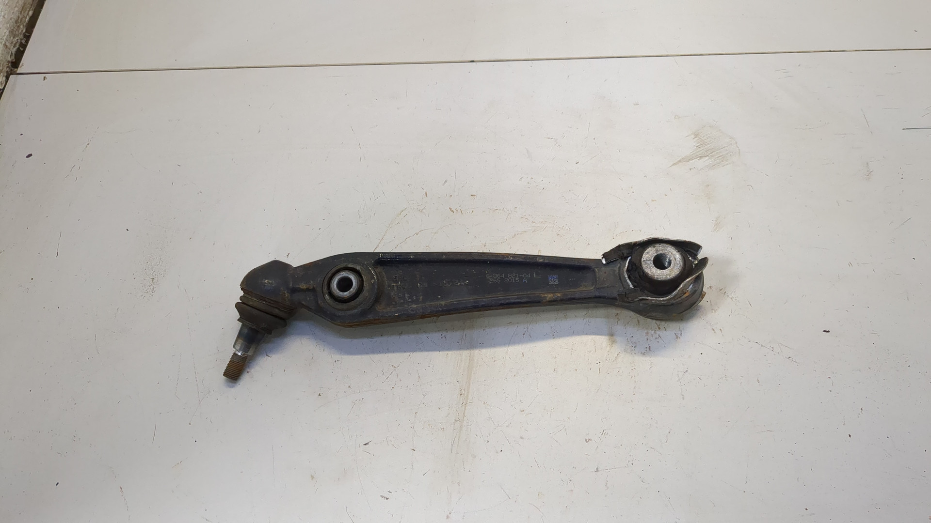 Рычаг передний левый