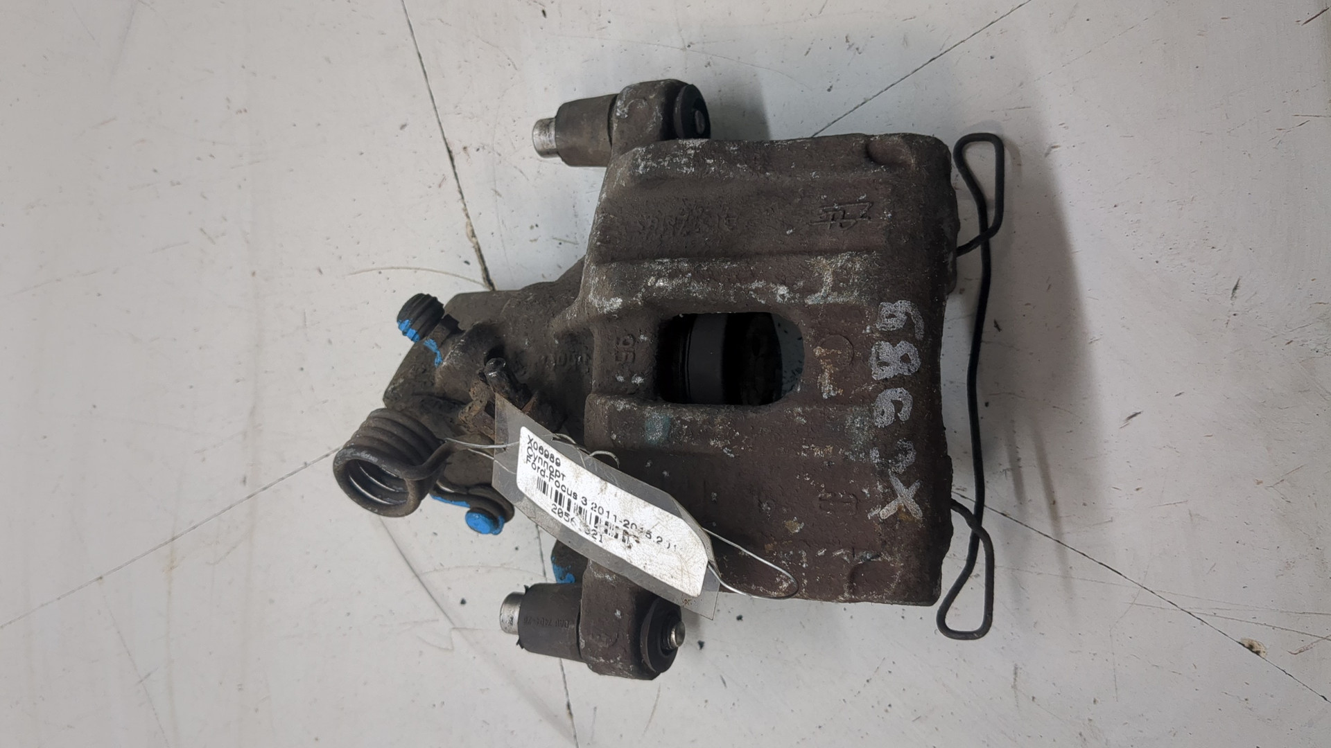 Суппорт задний левый