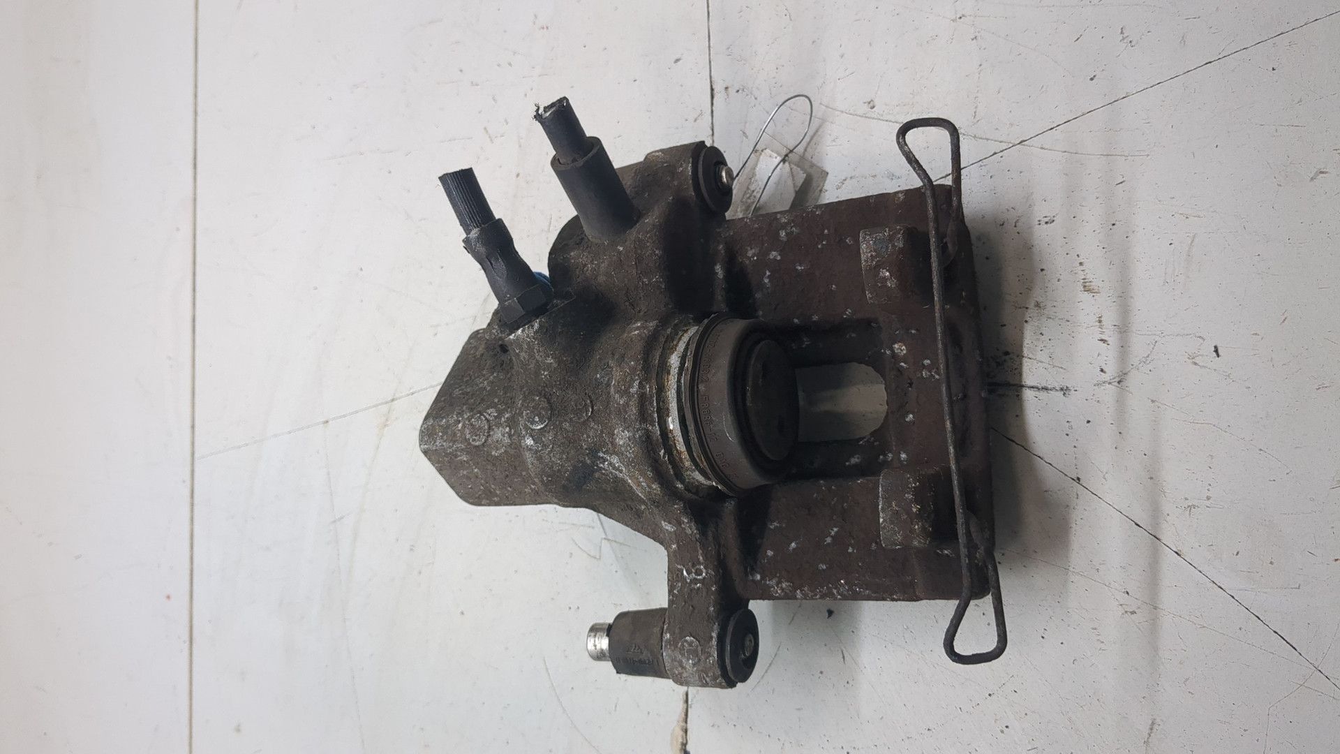 Суппорт задний левый