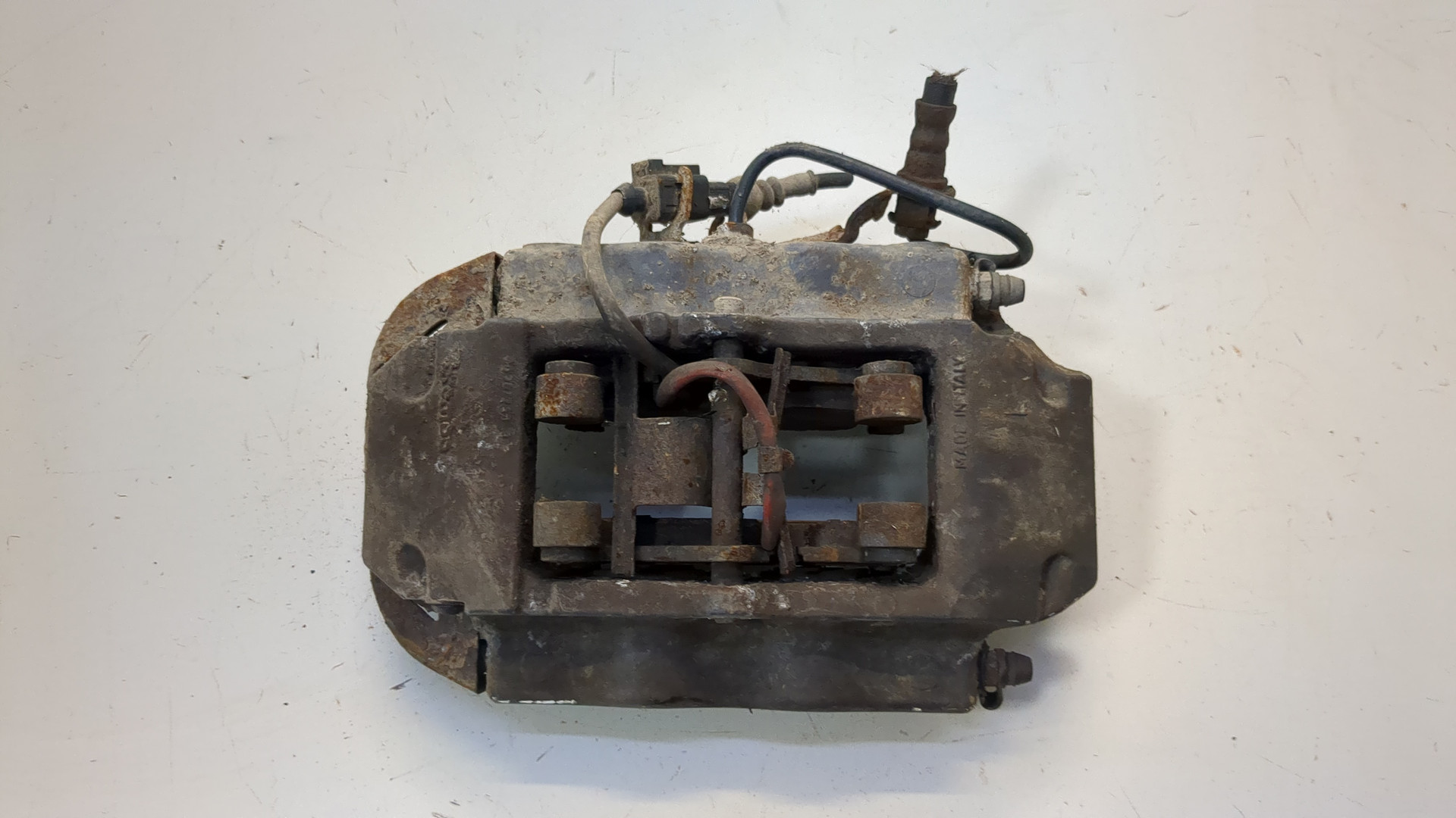 Суппорт задний левый