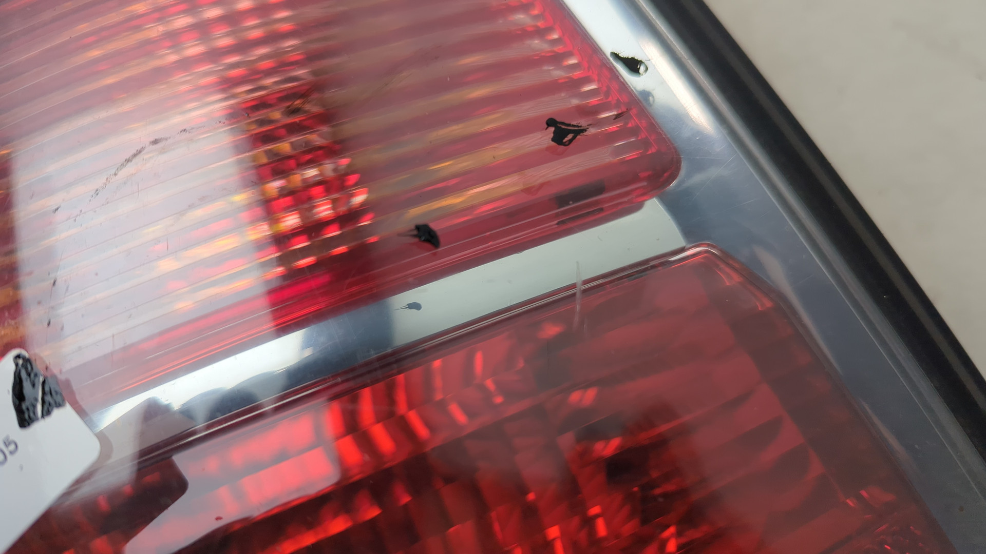 Фонарь задний левый