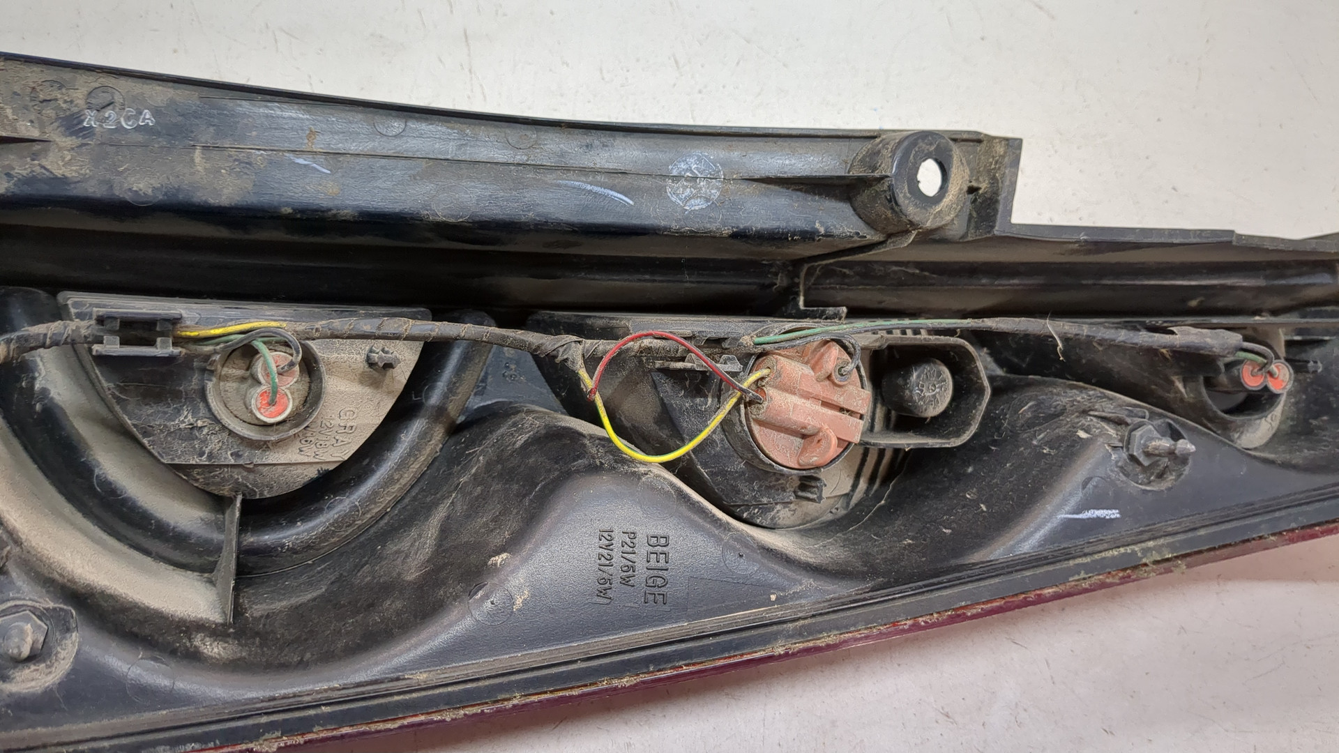 Фонарь задний левый