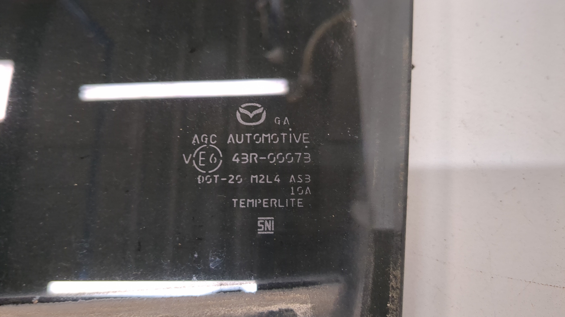 Стекло двери задней левой