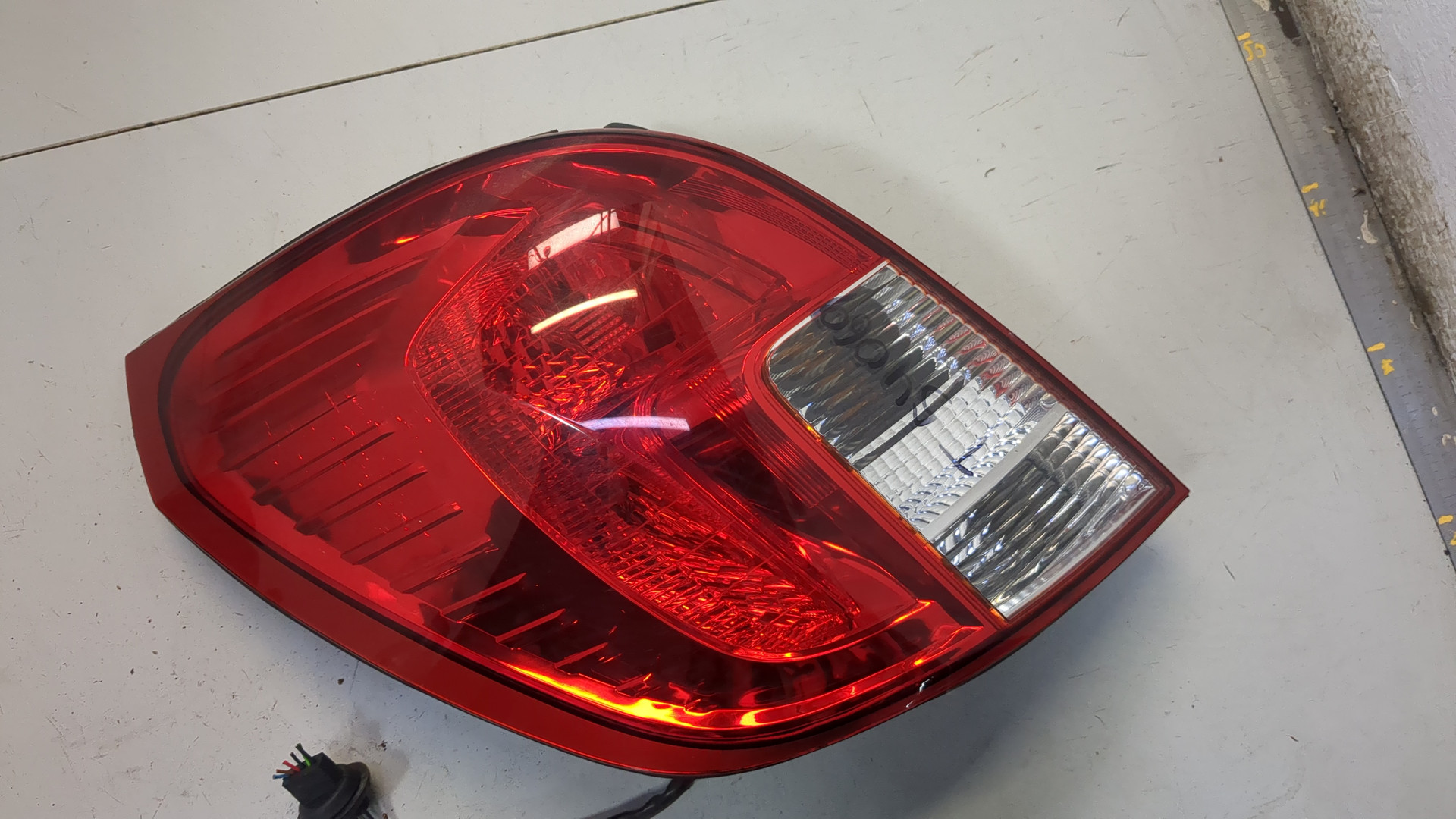 Фонарь задний левый