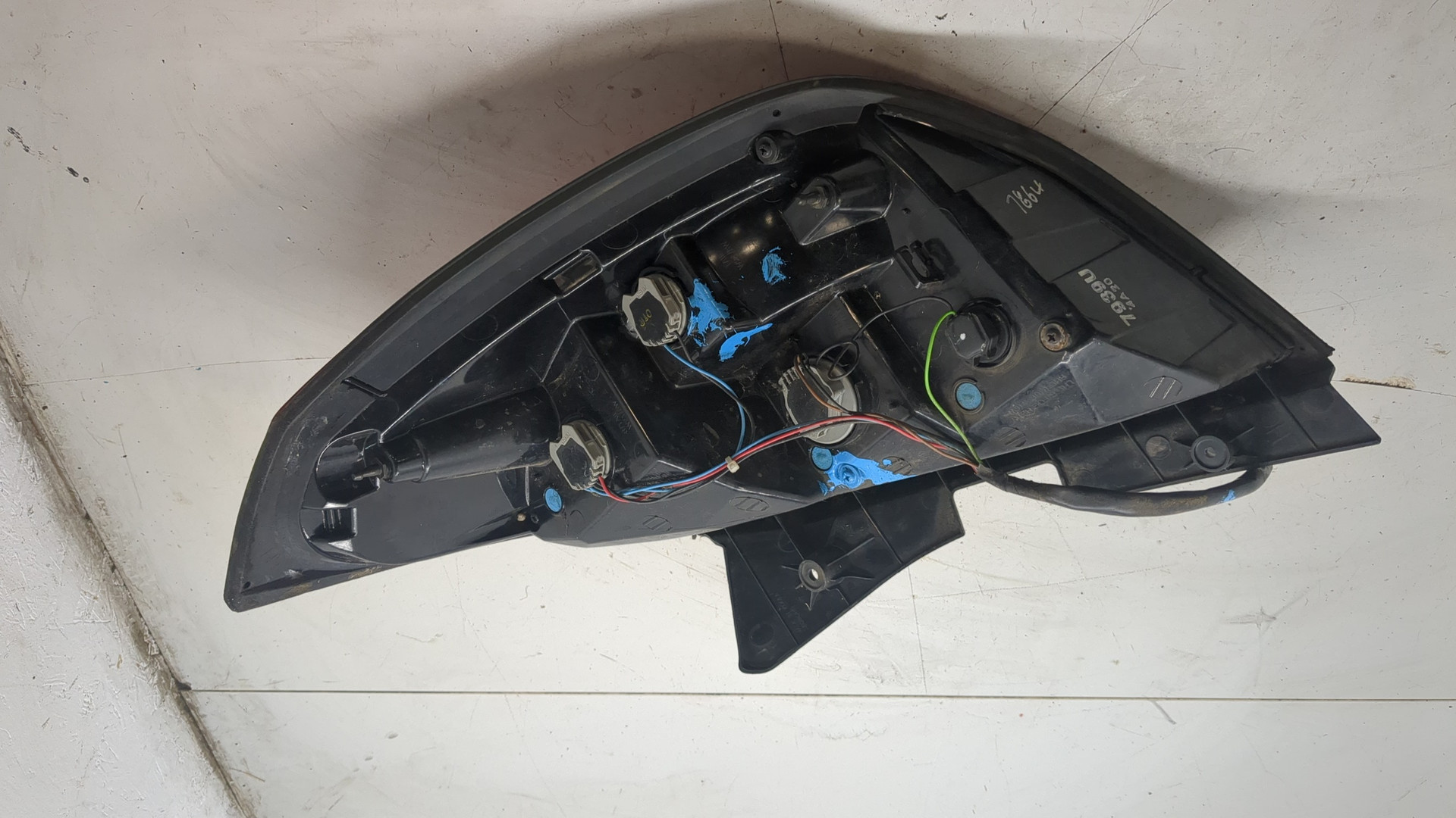 Фонарь задний левый