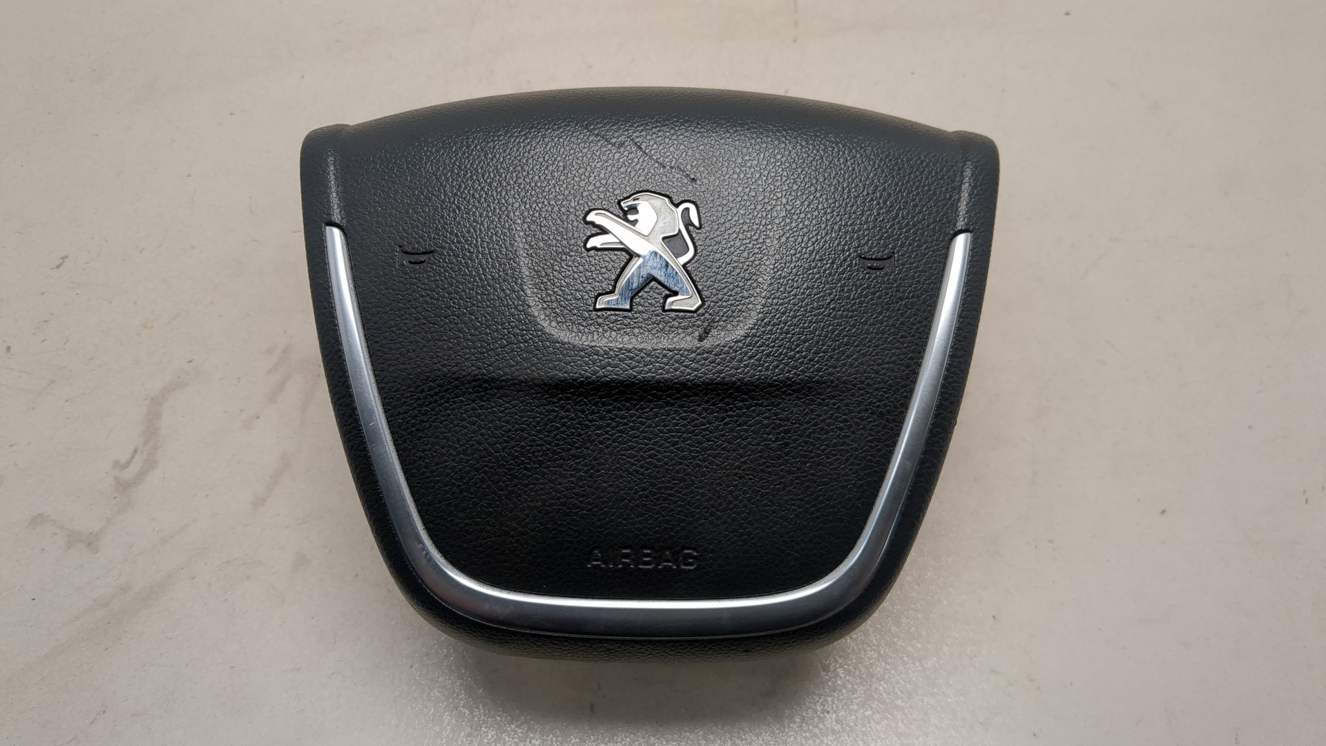 Подушка безопасности в рулевое колесо