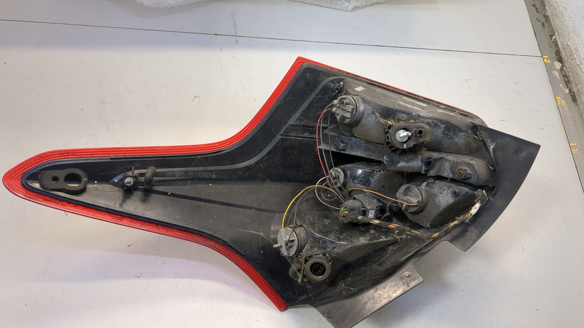 Фонарь задний левый