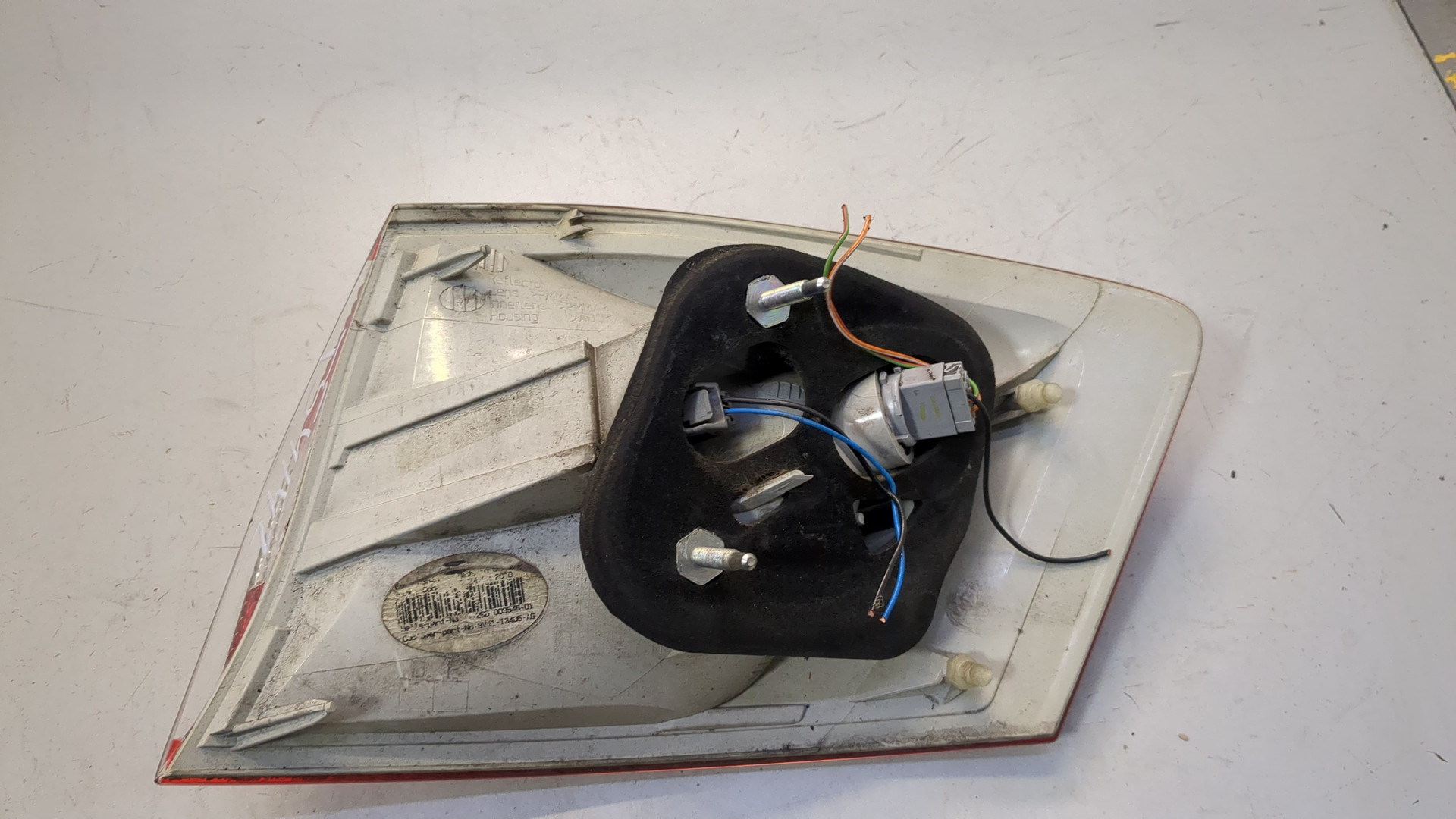 Фонарь задний левый