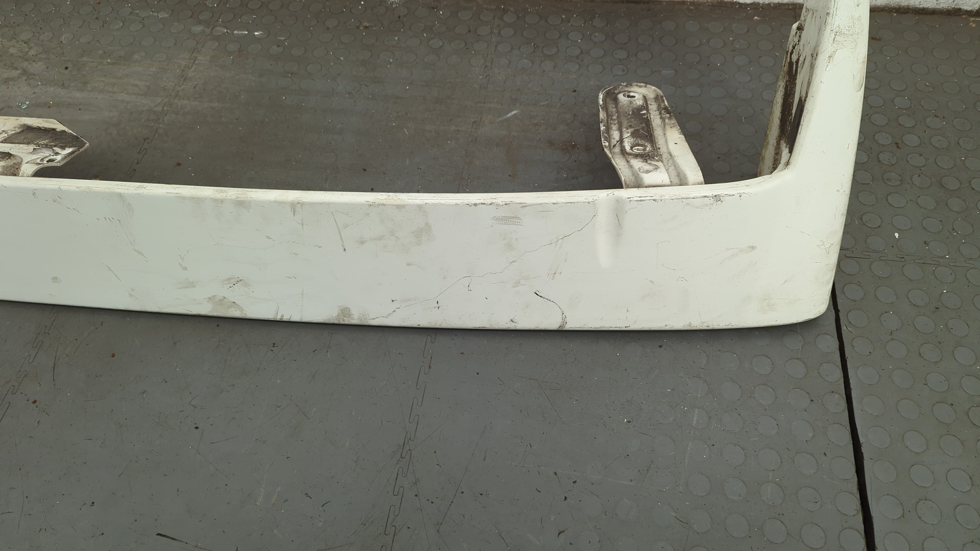 Спойлер переднего бампера левый