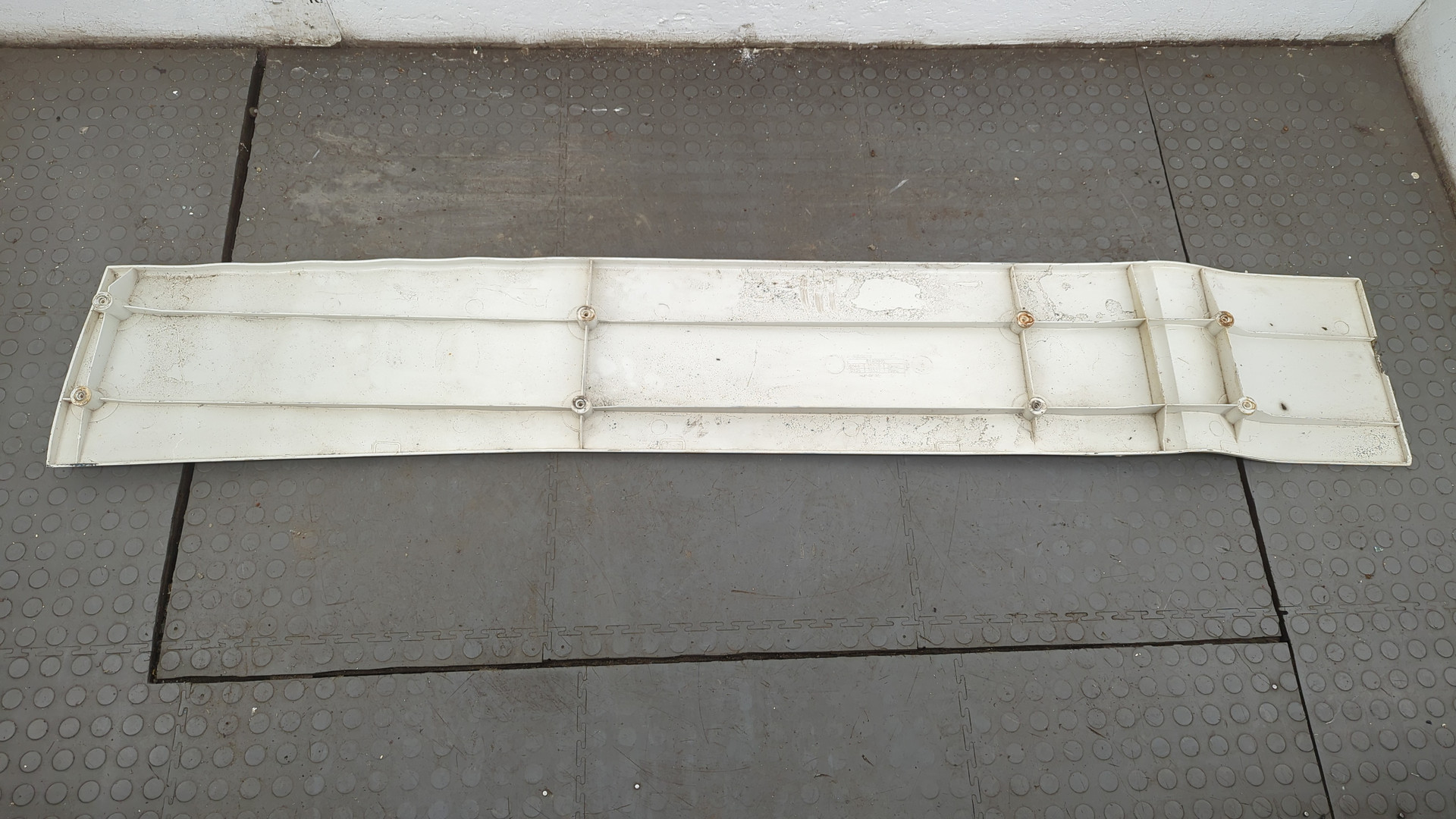 Спойлер переднего бампера левый