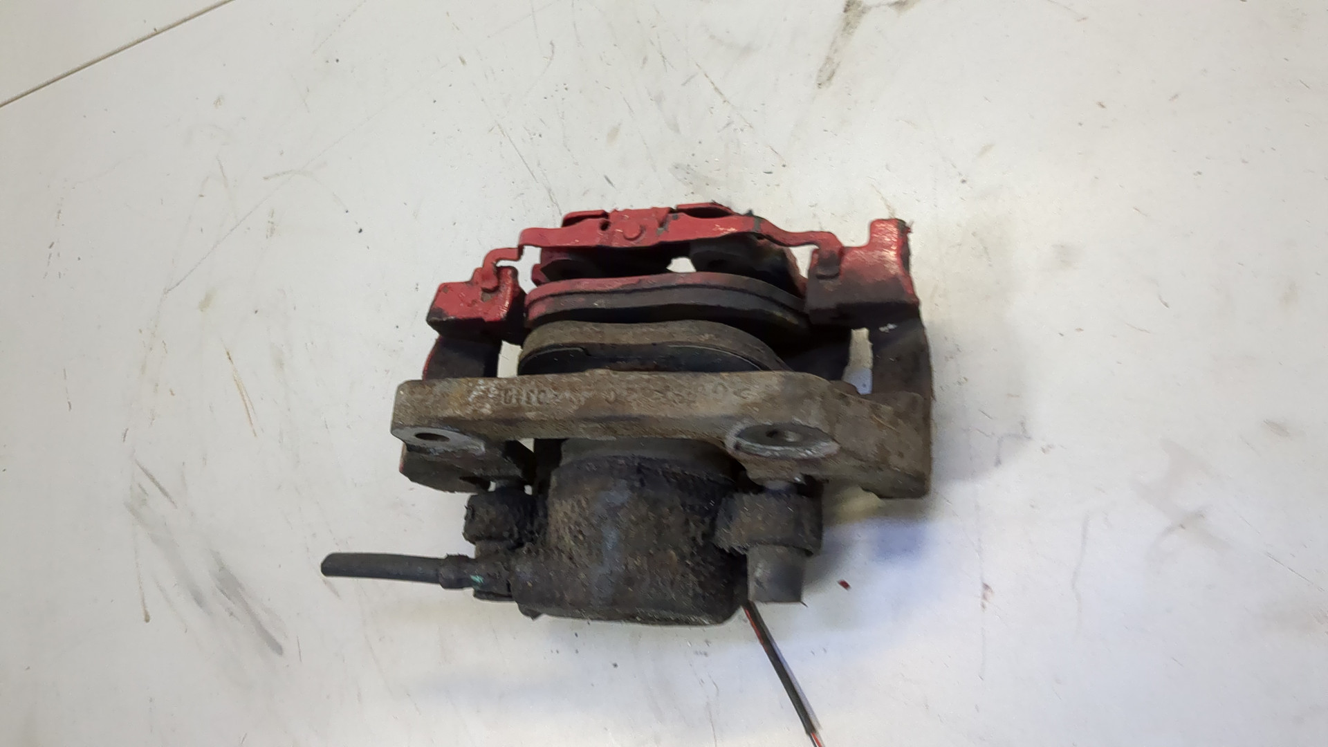 Суппорт передний левый