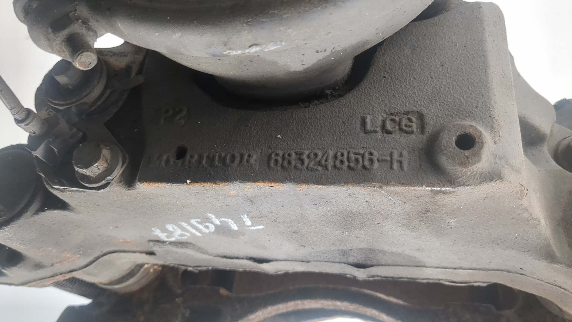 Суппорт задний левый