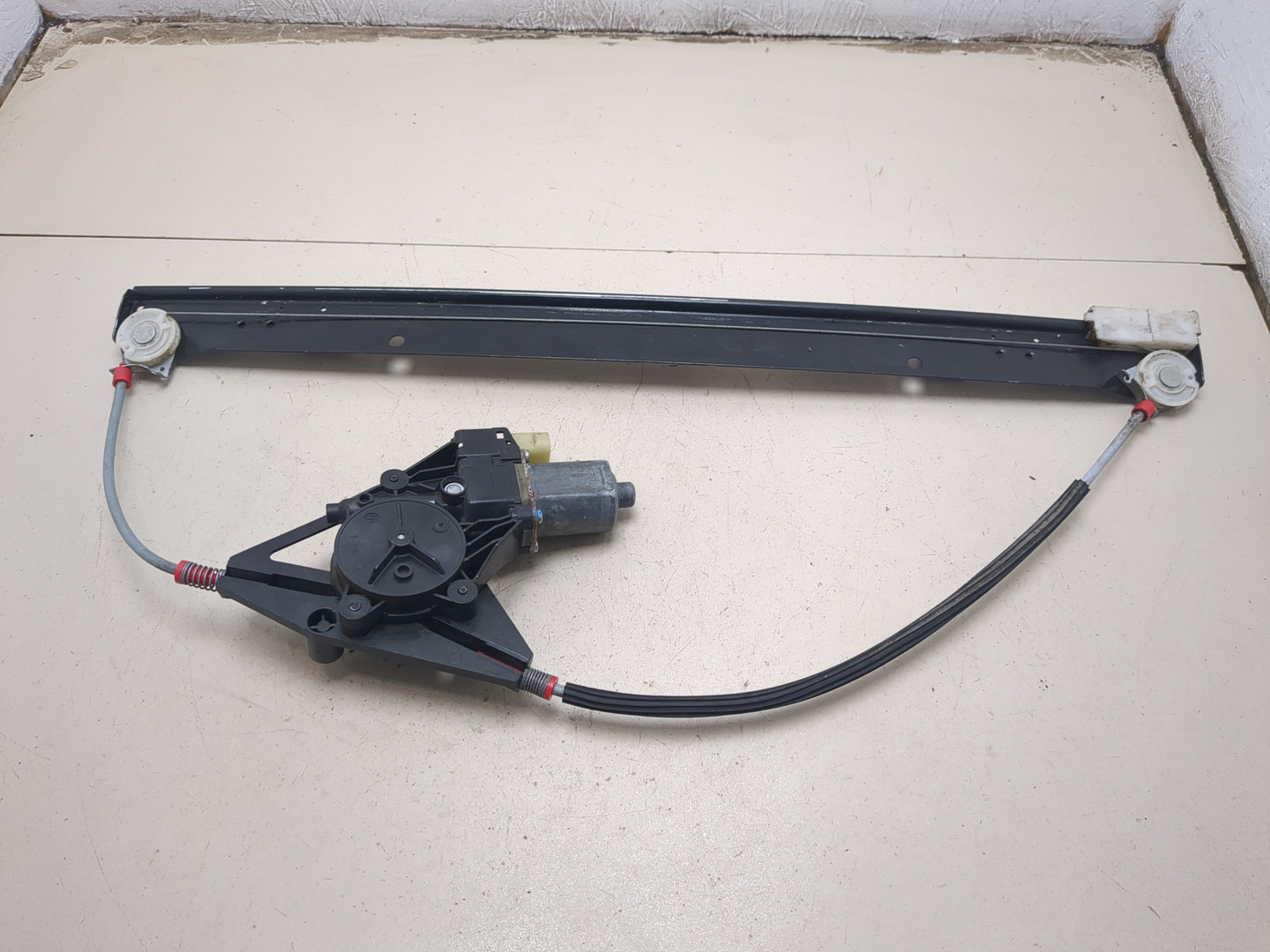 Стеклоподъемник электр. передний левый