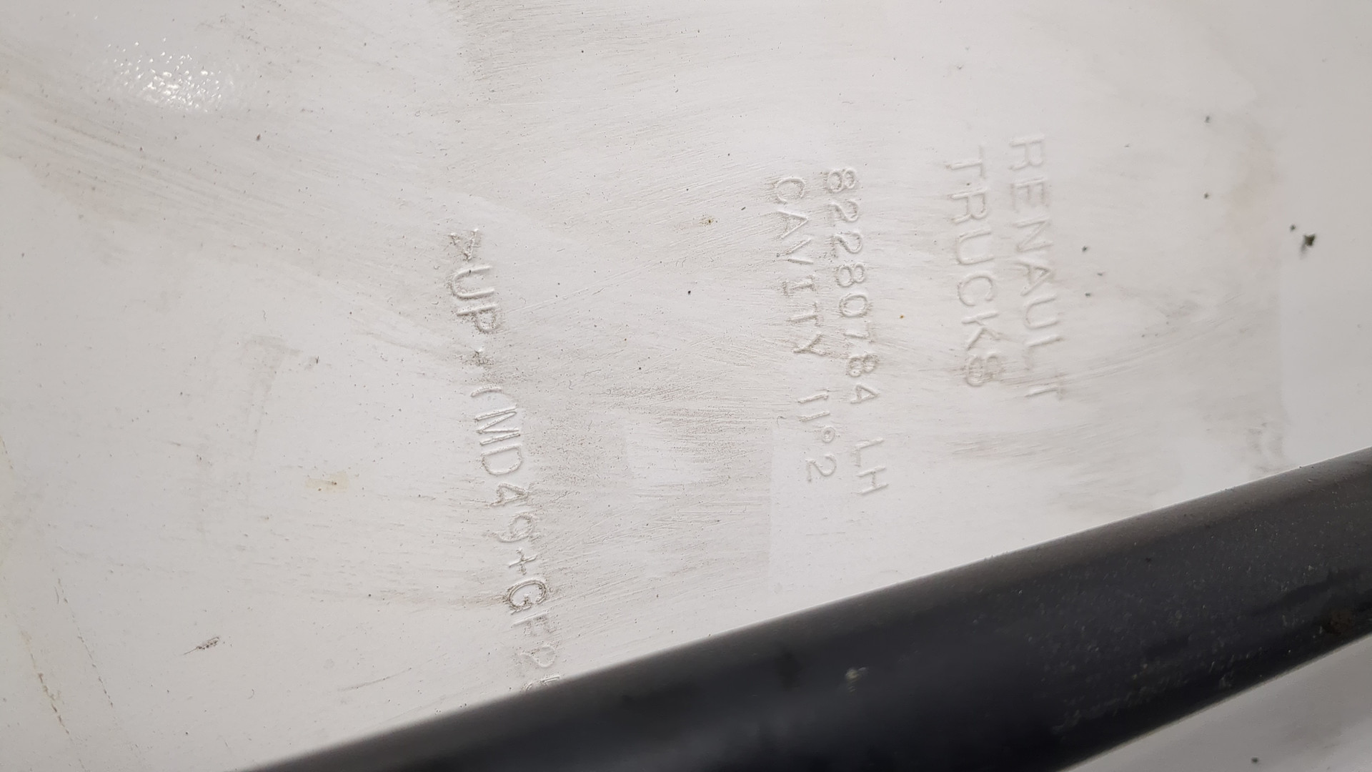 Спойлер переднего бампера левый