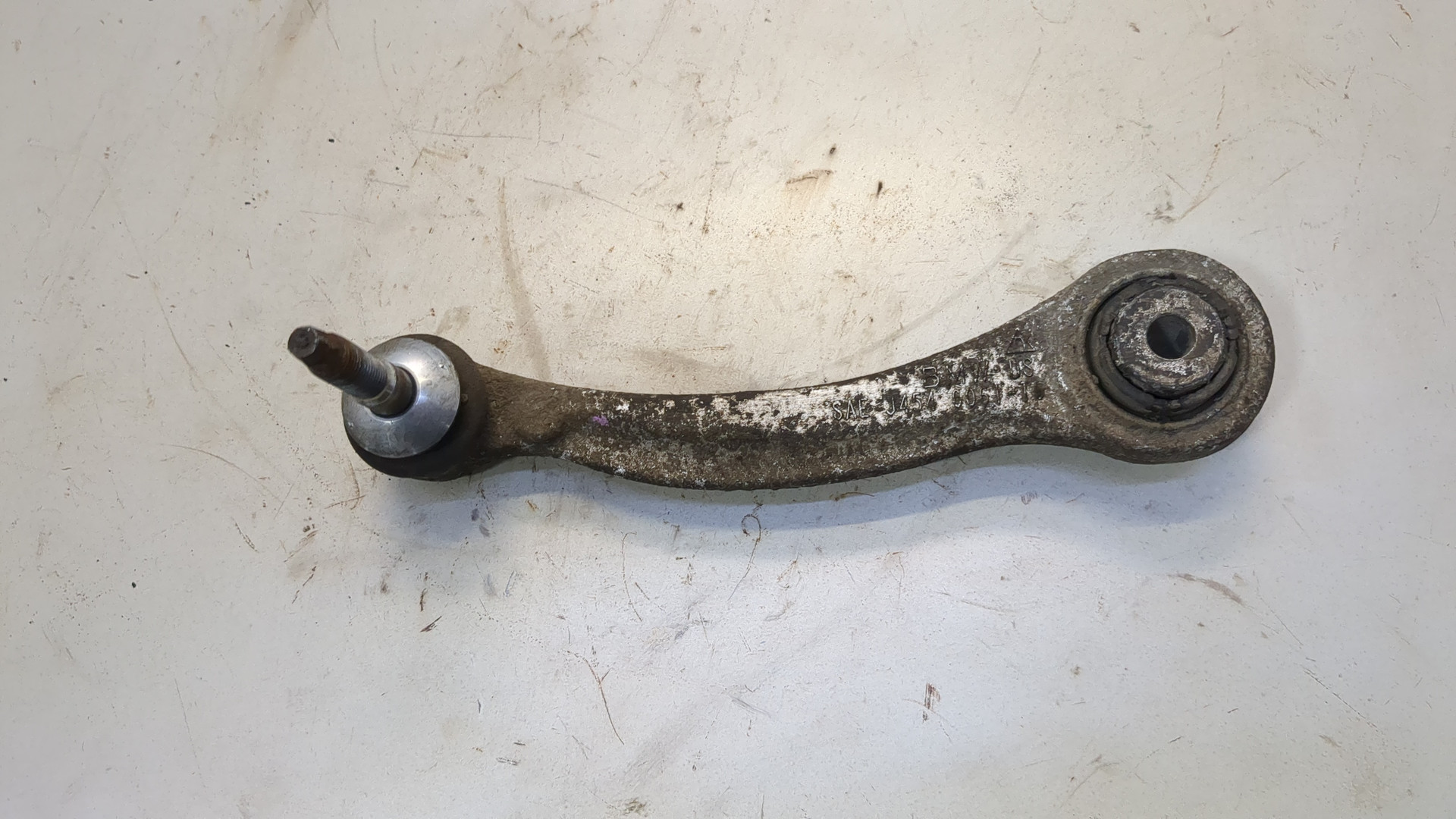 Рычаг задний левый