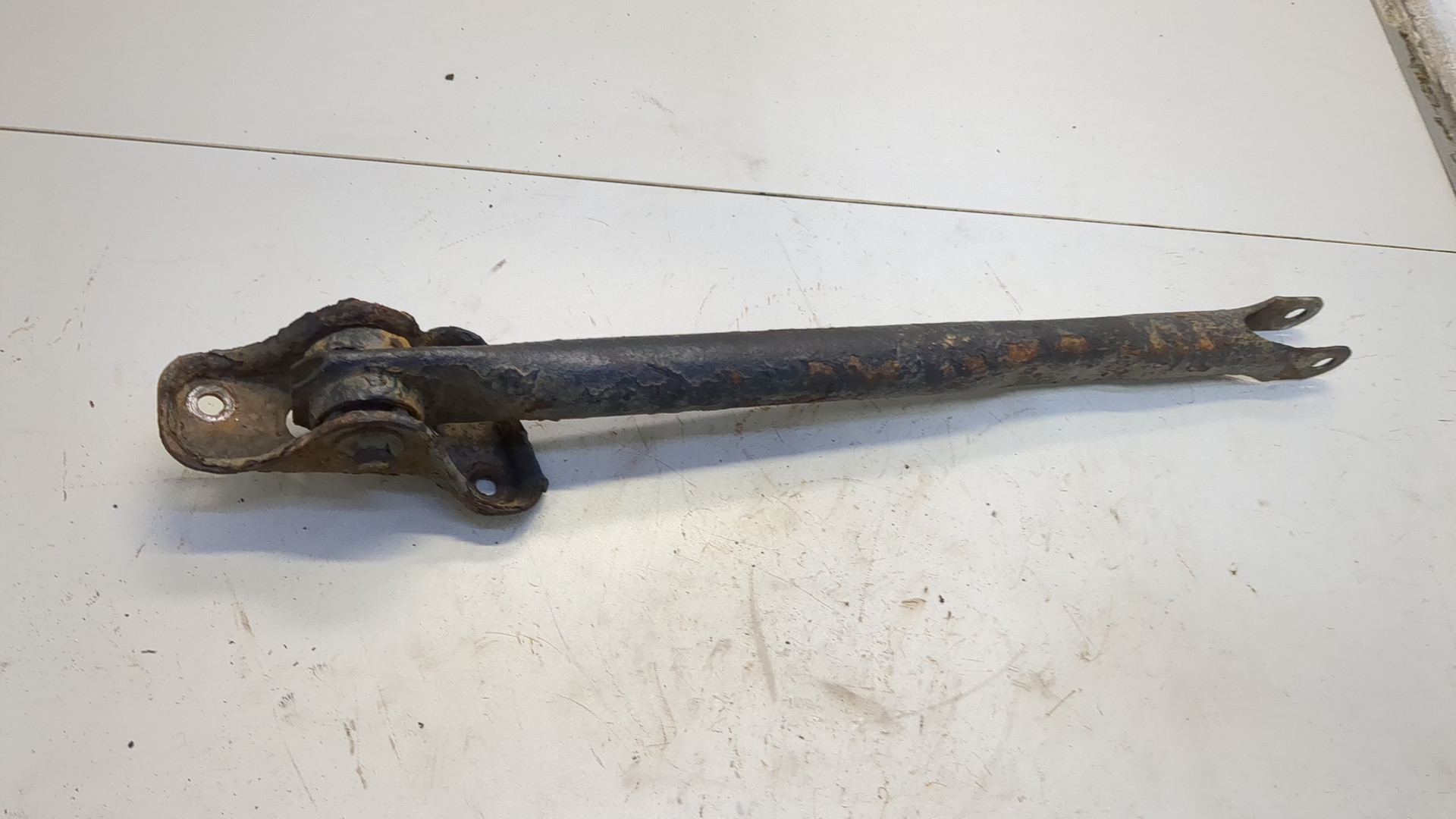 Рычаг задний