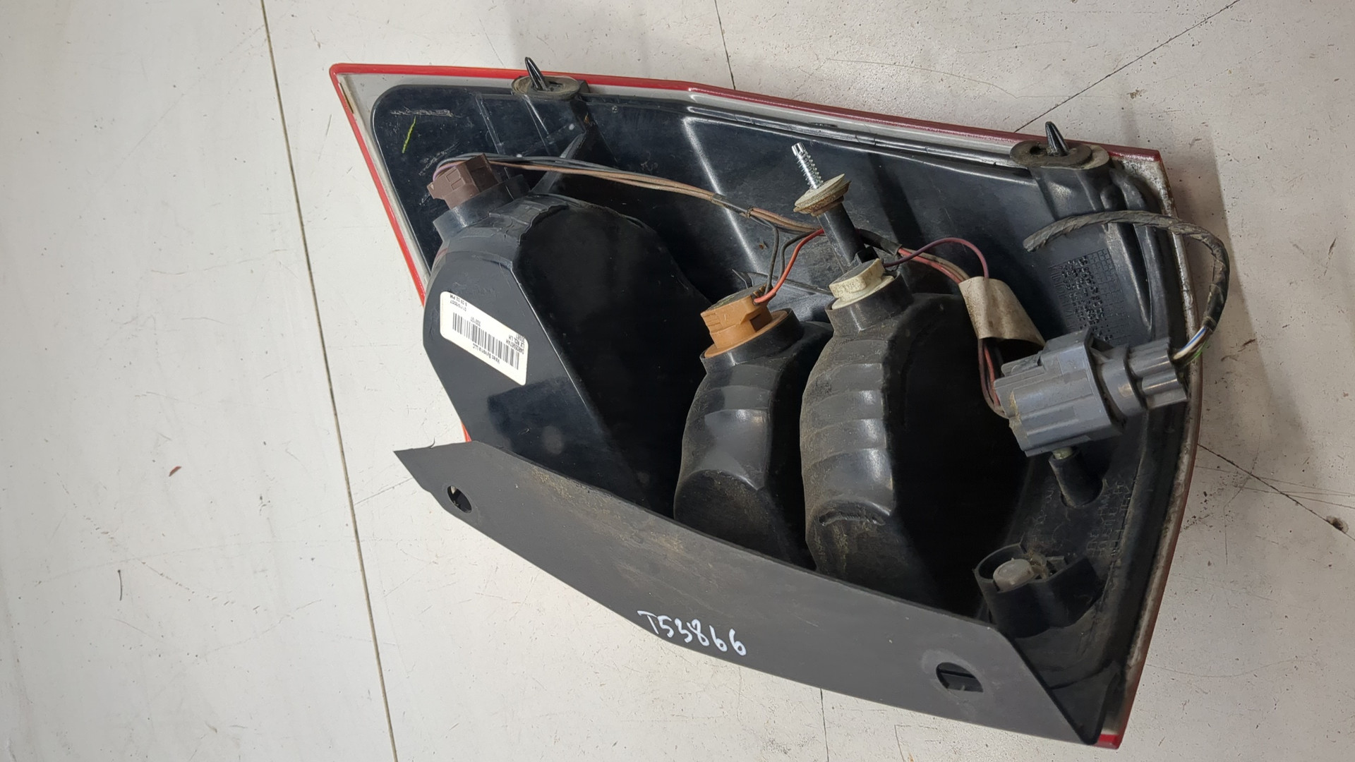 Фонарь задний левый